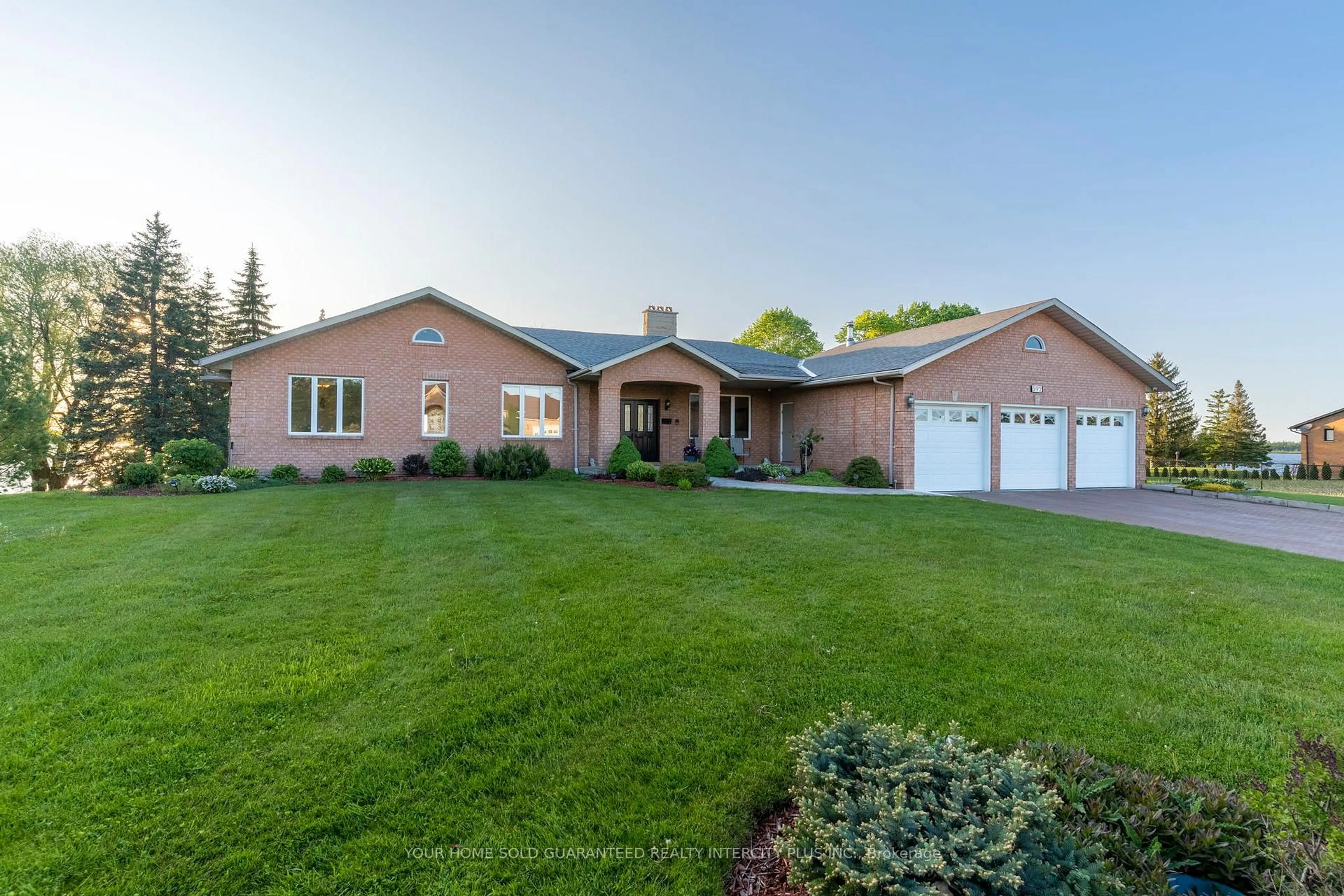 Home with brick exterior material, street for 592 Fralicks Beach Rd, Scugog Ontario L9L 1B6