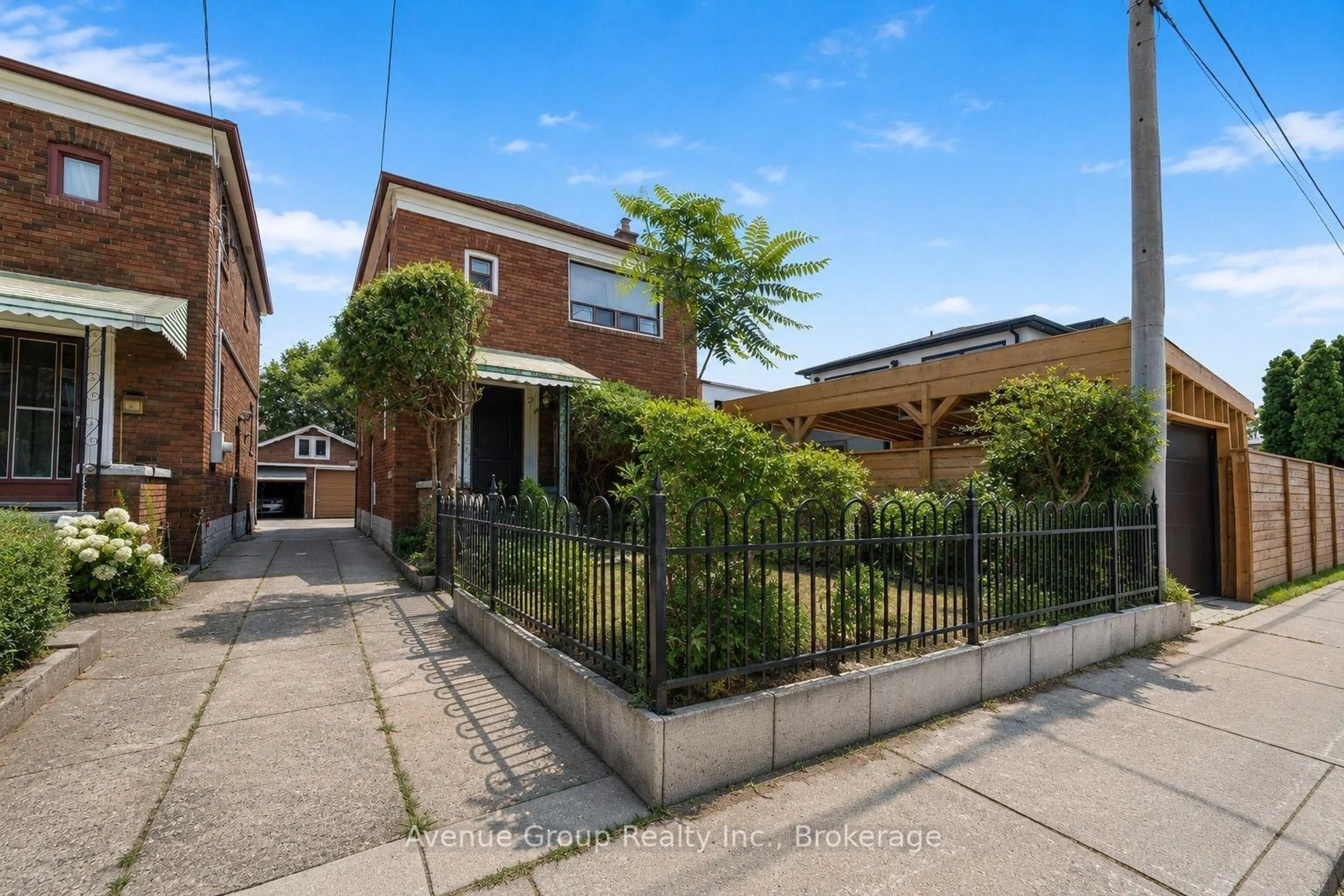 Home with brick exterior material, street for 1 Warland Ave, Toronto Ontario M4J 3E8