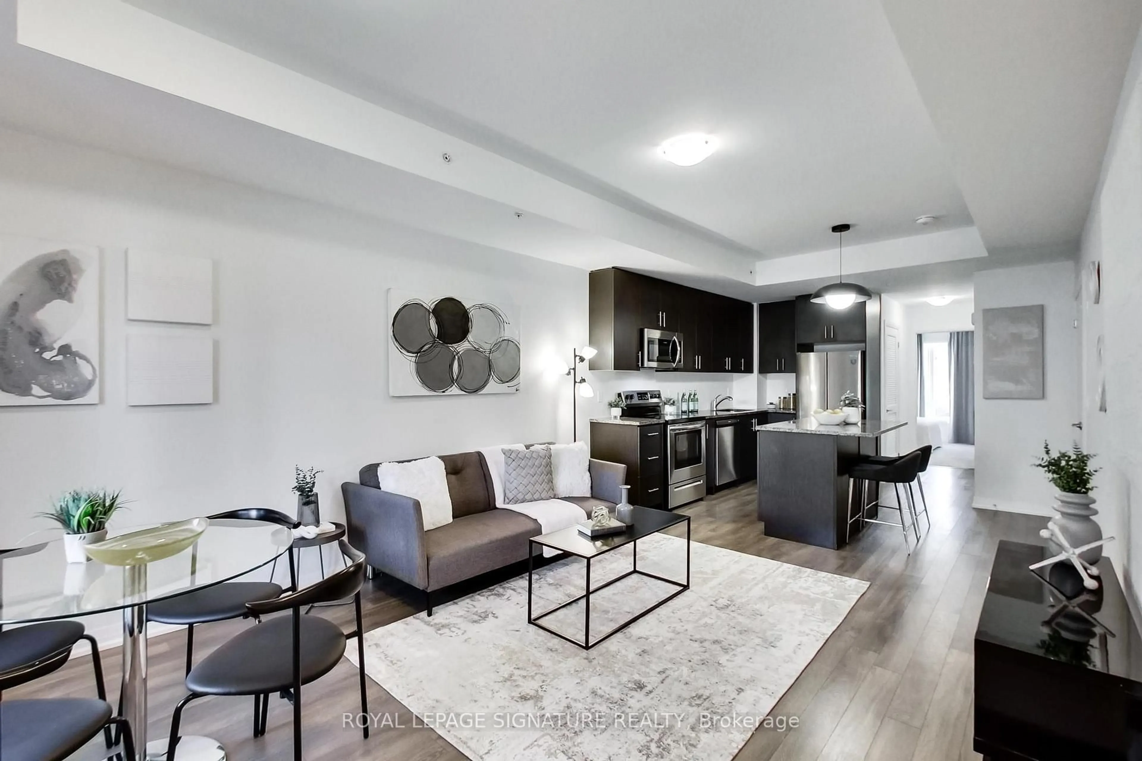 Living room with furniture, unknown for 2635 William Jackson Dr #113, Pickering Ontario L1X 0L5
