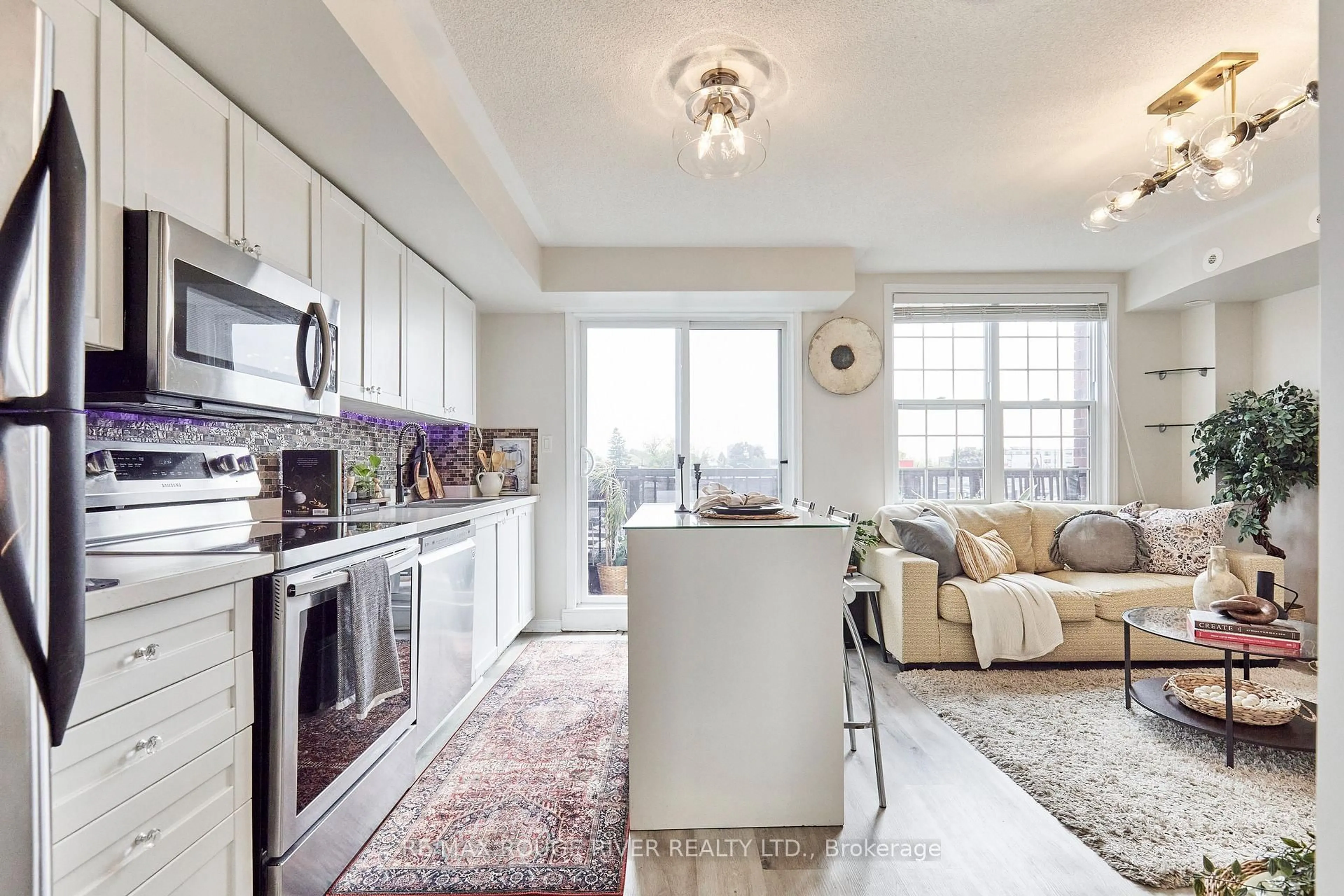 Open concept kitchen, ceramic/tile floor for 25 Strangford Lane #312, Toronto Ontario M1L 0E5