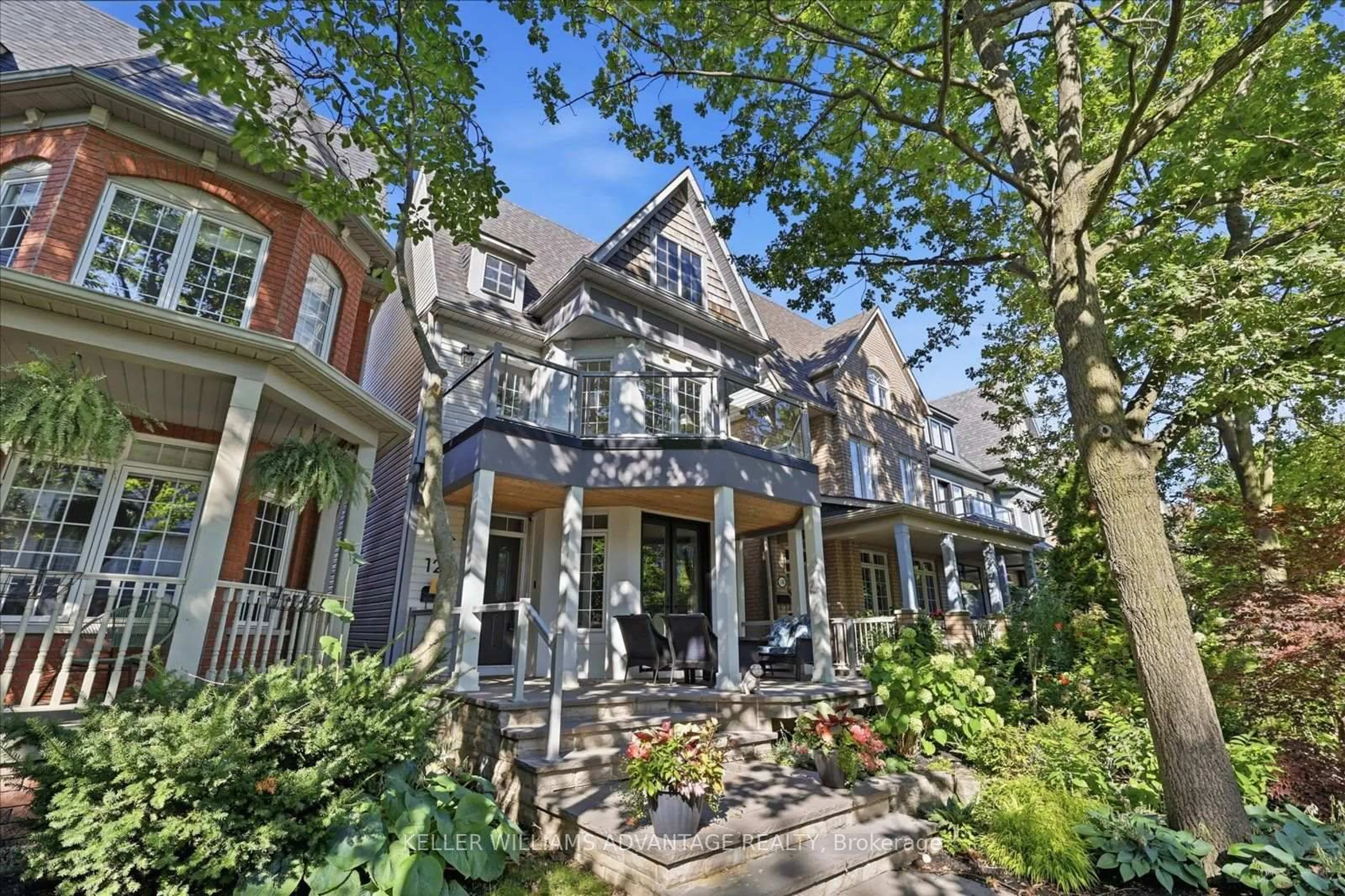 Home with brick exterior material, street for 128 Boardwalk Dr, Toronto Ontario M4L 3X4