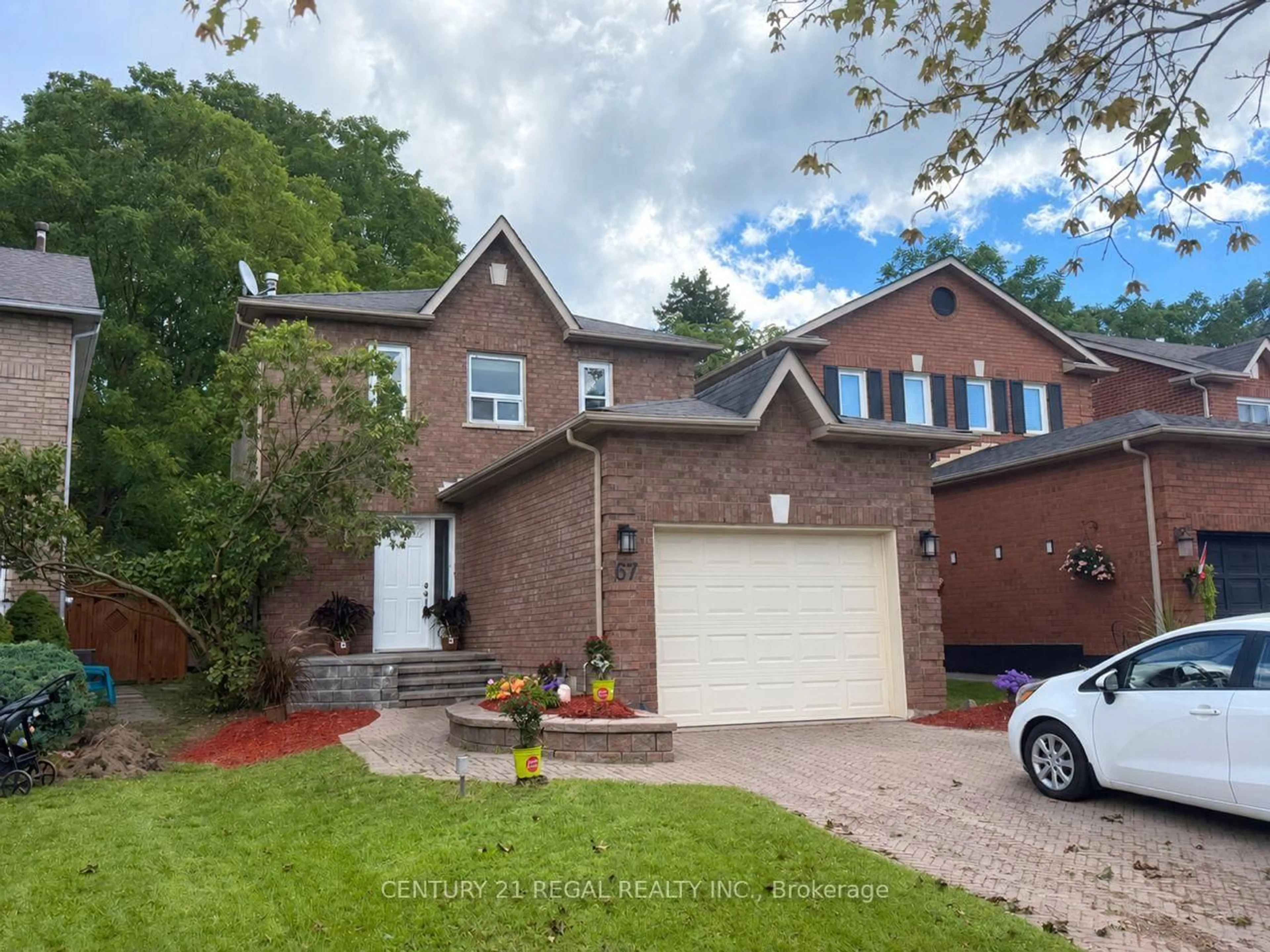 Home with brick exterior material, street for 67 Fulton Cres, Whitby Ontario L1R 2E1