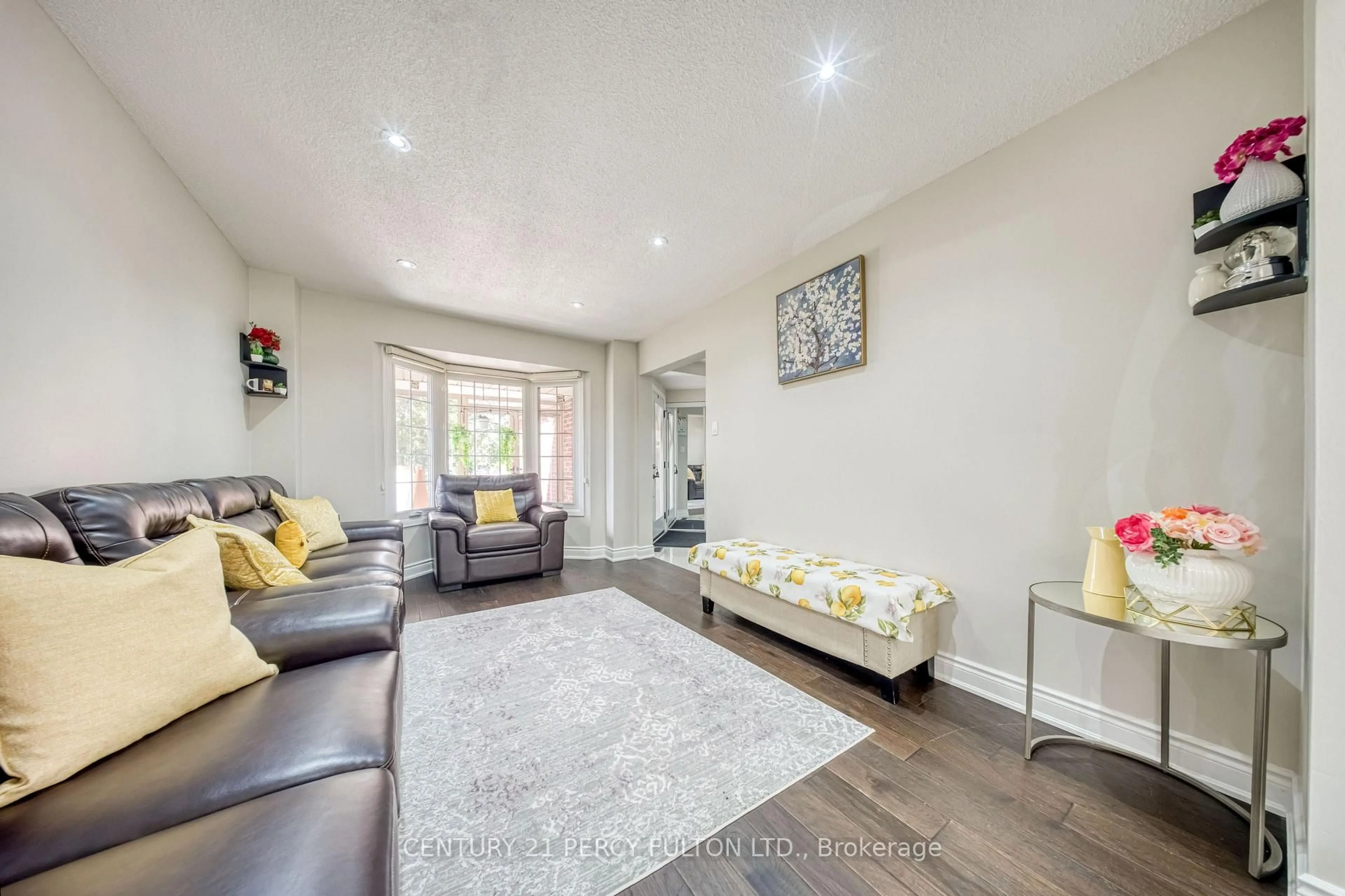 Living room with furniture, wood/laminate floor for 46 Hearne Cres, Ajax Ontario L1T 3P6