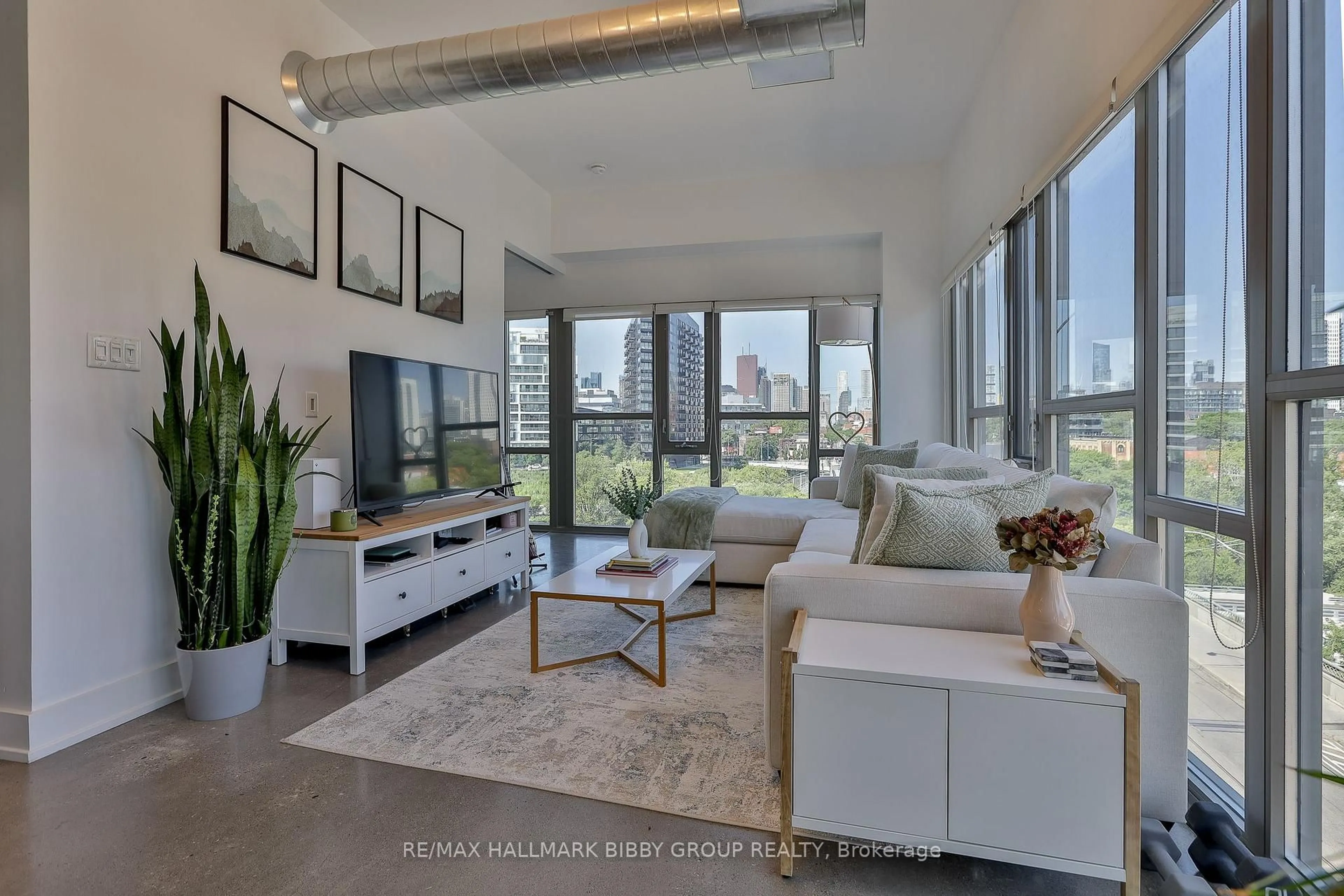 Living room with furniture, unknown for 625 Queen St #409, Toronto Ontario M4M 1G4