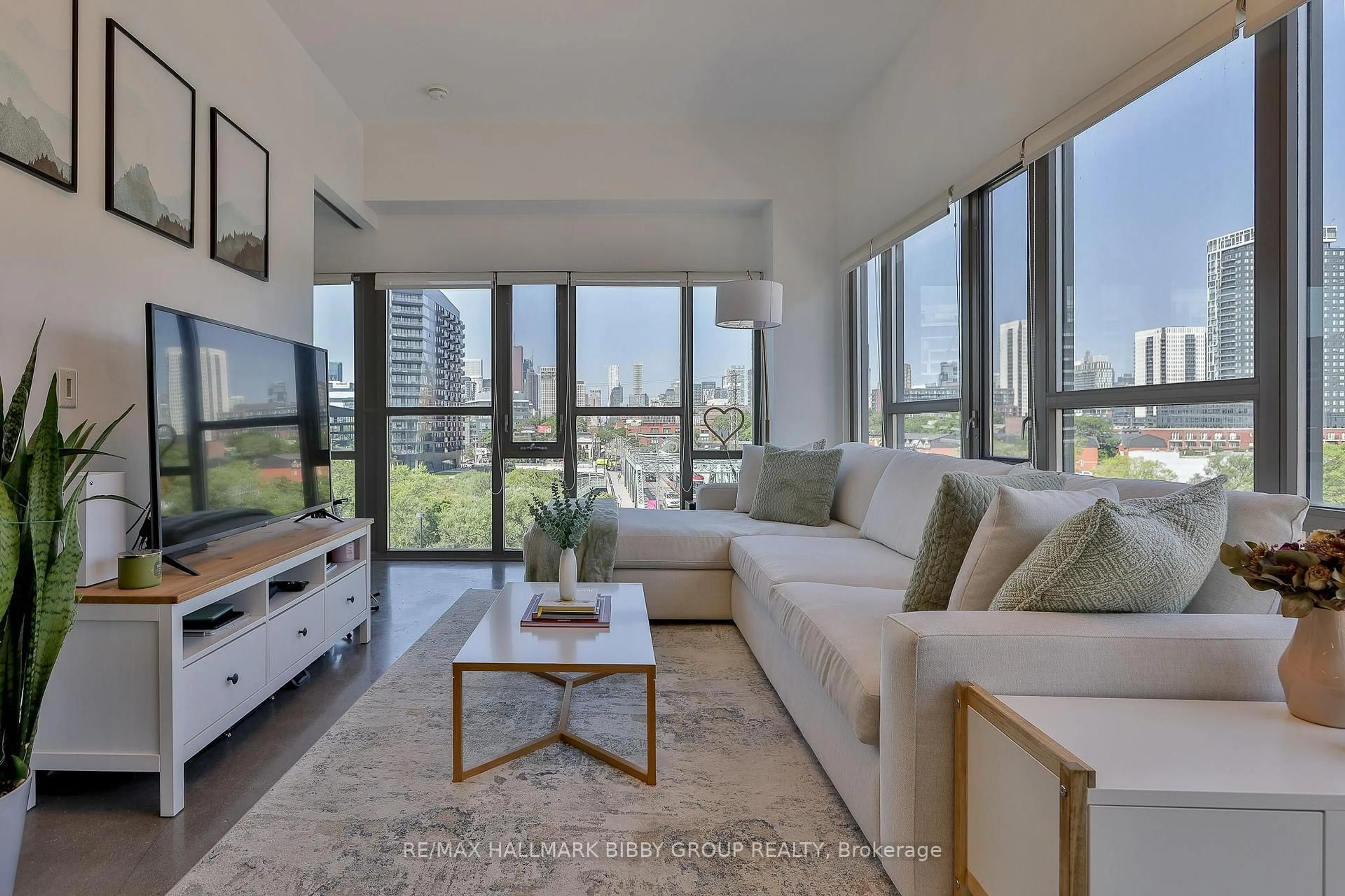 Living room with furniture, unknown for 625 Queen St #409, Toronto Ontario M4M 1G4