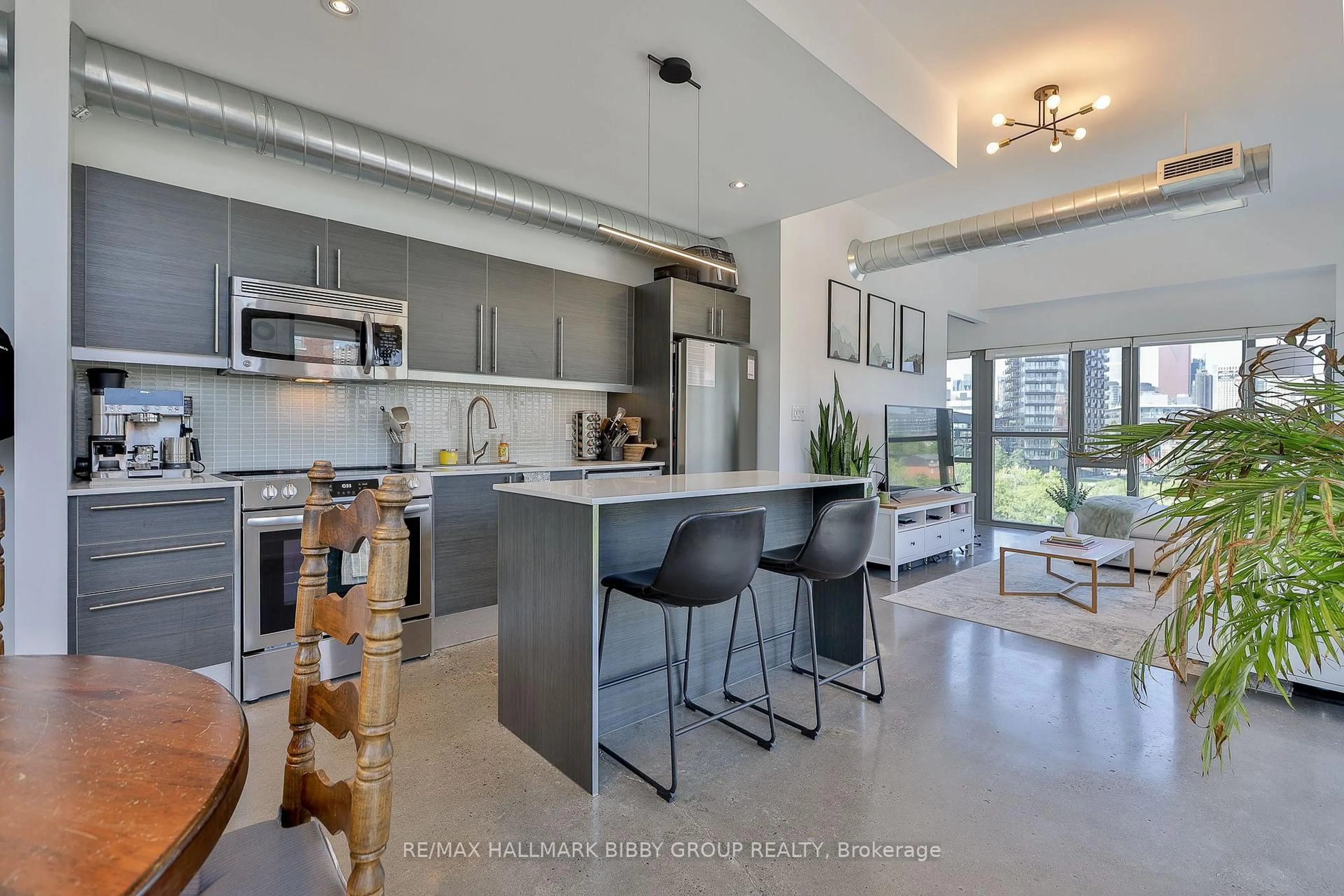 Open concept kitchen, ceramic/tile floor for 625 Queen St #409, Toronto Ontario M4M 1G4