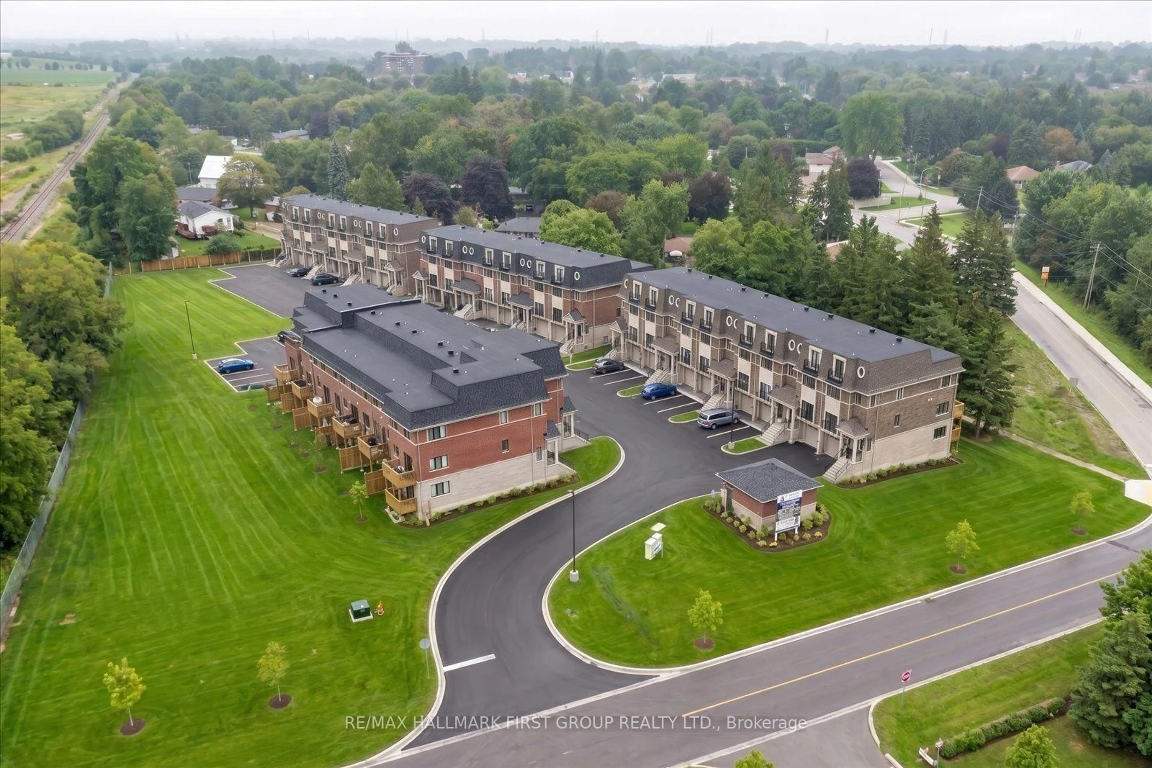 A pic from outside/outdoor area/front of a property/back of a property/a pic from drone, unknown for 55 Marret Lane, Clarington Ontario L1B 0X2