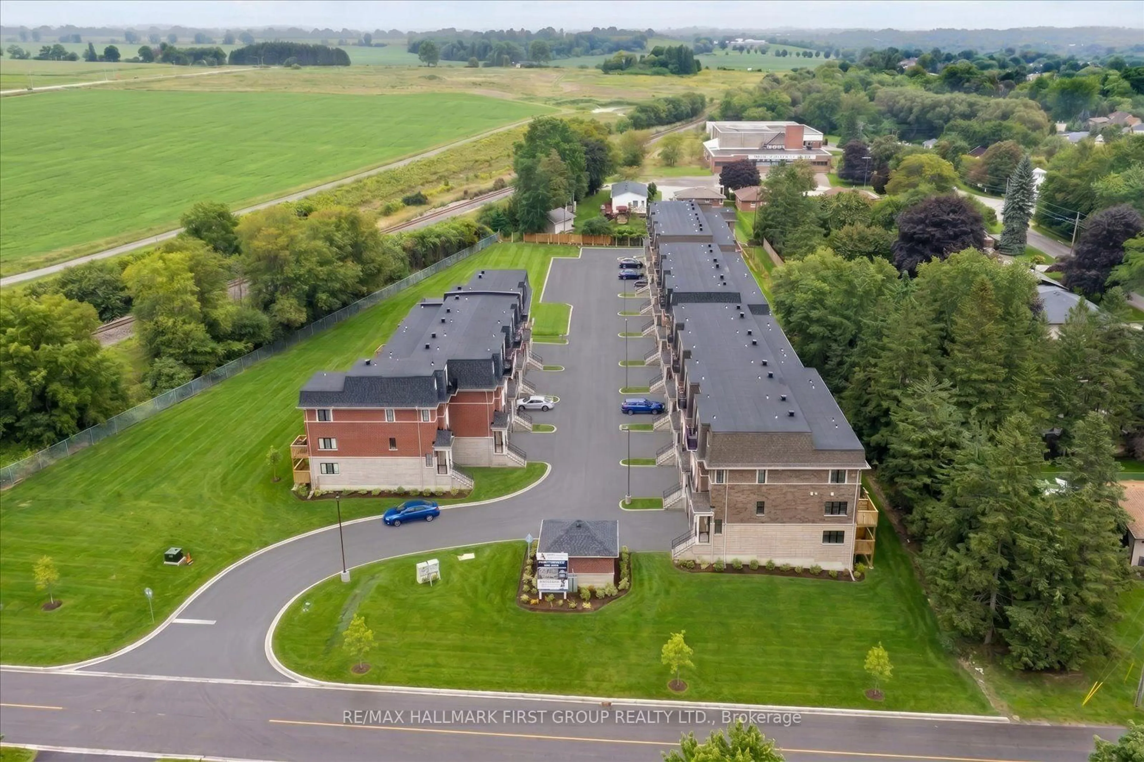 A pic from outside/outdoor area/front of a property/back of a property/a pic from drone, unknown for 55 Marret Lane, Clarington Ontario L1B 0X2