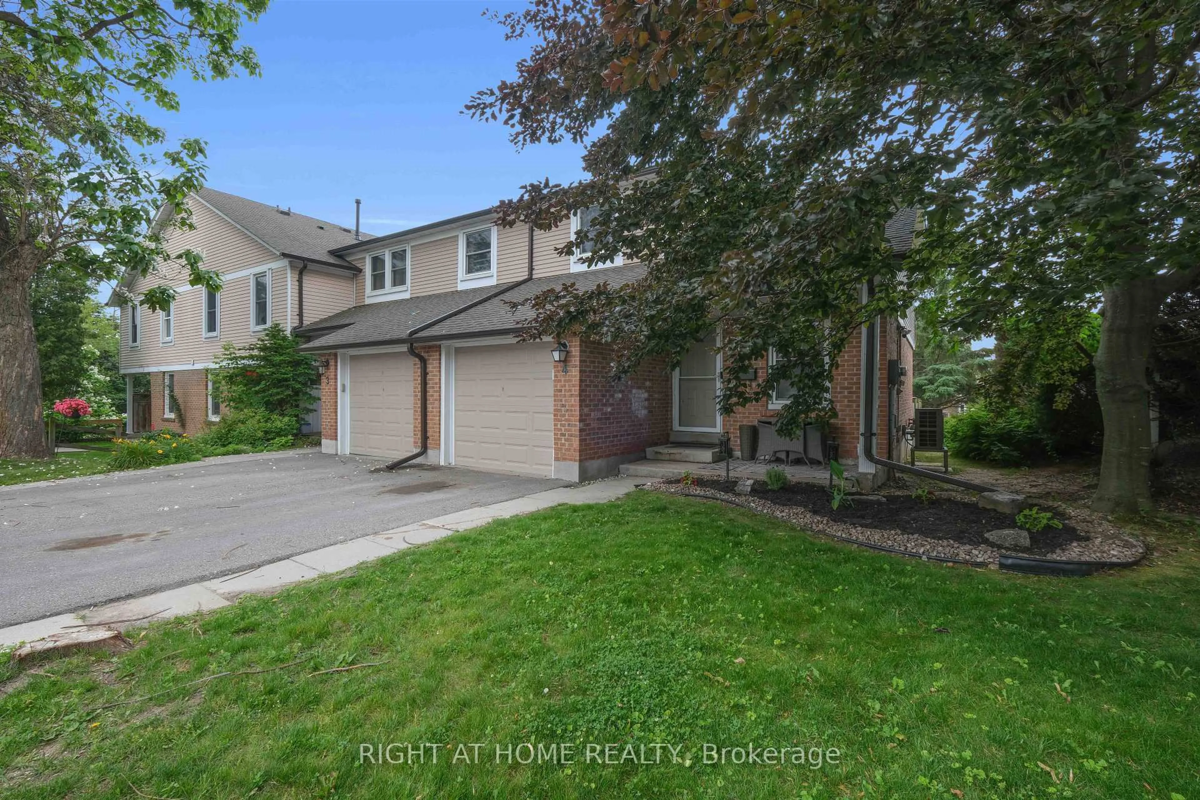 A pic from outside/outdoor area/front of a property/back of a property/a pic from drone, street for 1055 Central Park Blvd ##4, Oshawa Ontario L1G 7M4