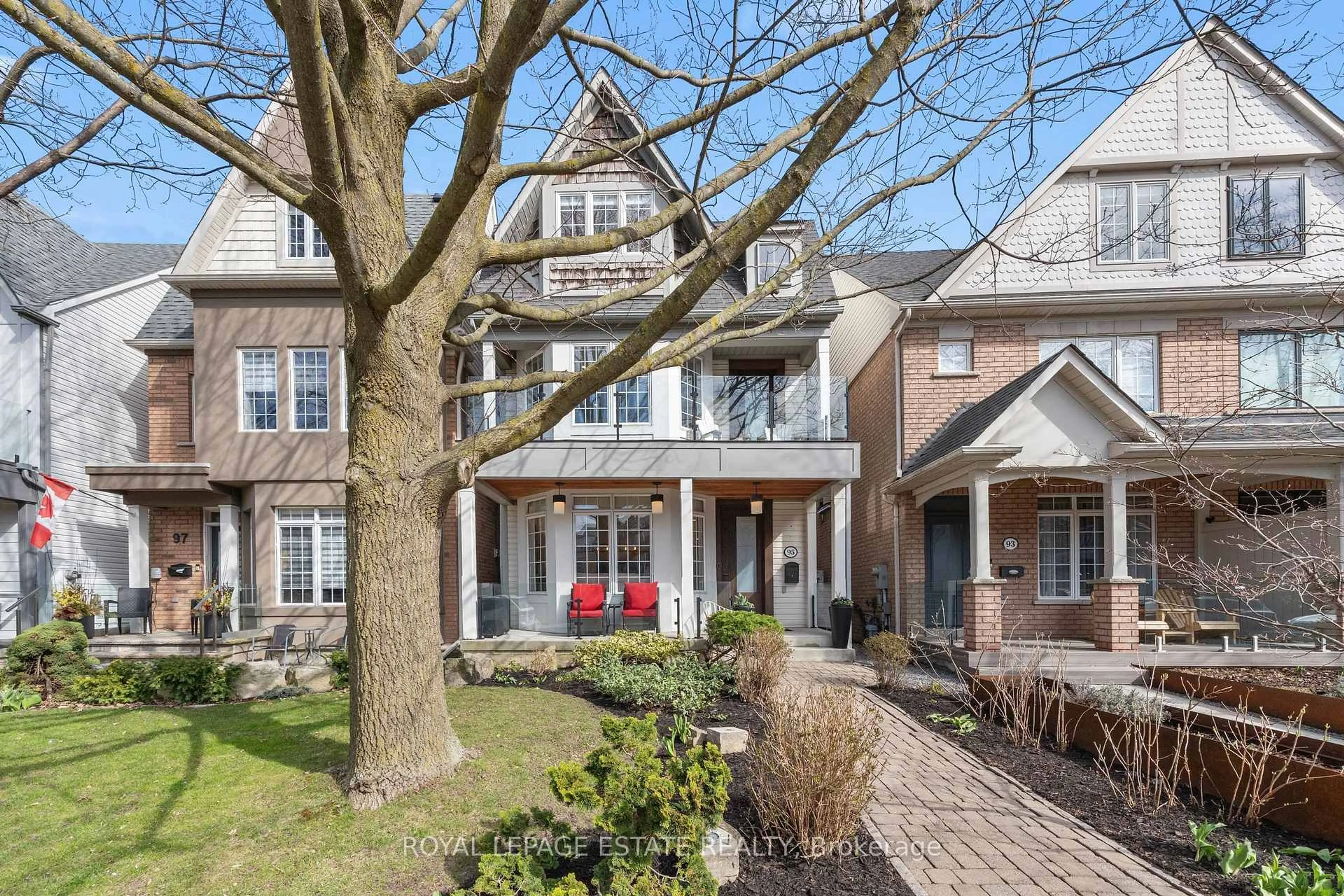 Home with brick exterior material, street for 95 Boardwalk Dr, Toronto Ontario M4L 3X9