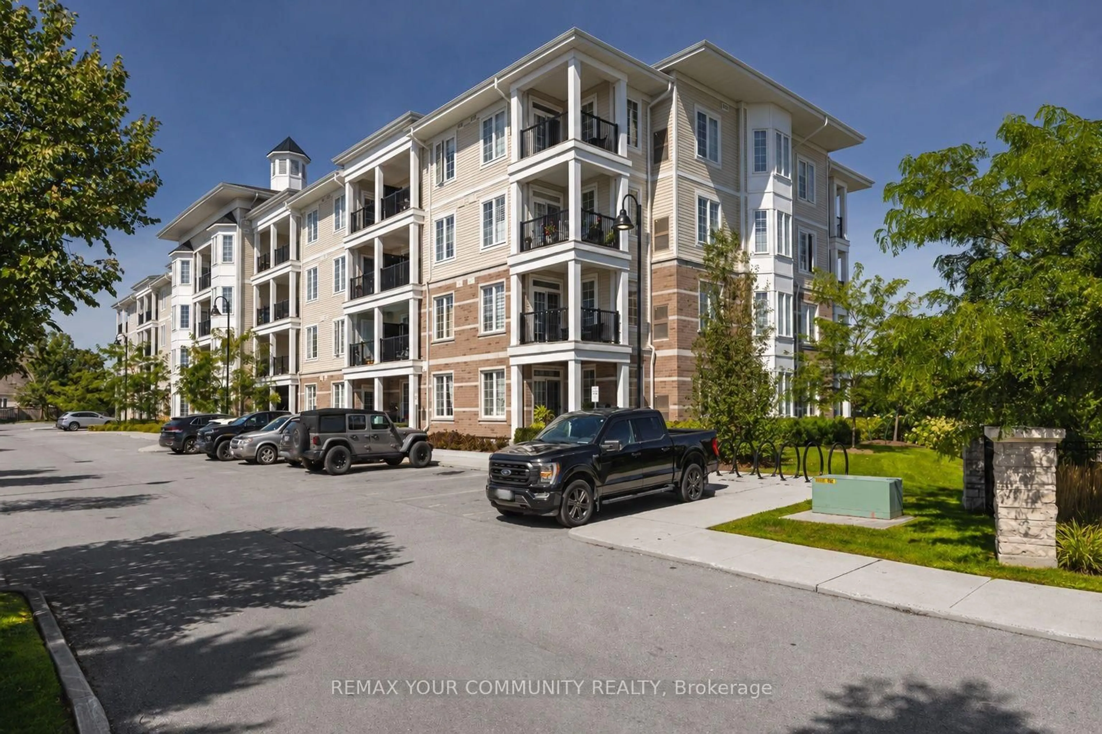 A pic from outside/outdoor area/front of a property/back of a property/a pic from drone, unknown for 65 Shipway Ave #202, Clarington Ontario L1B 0W2