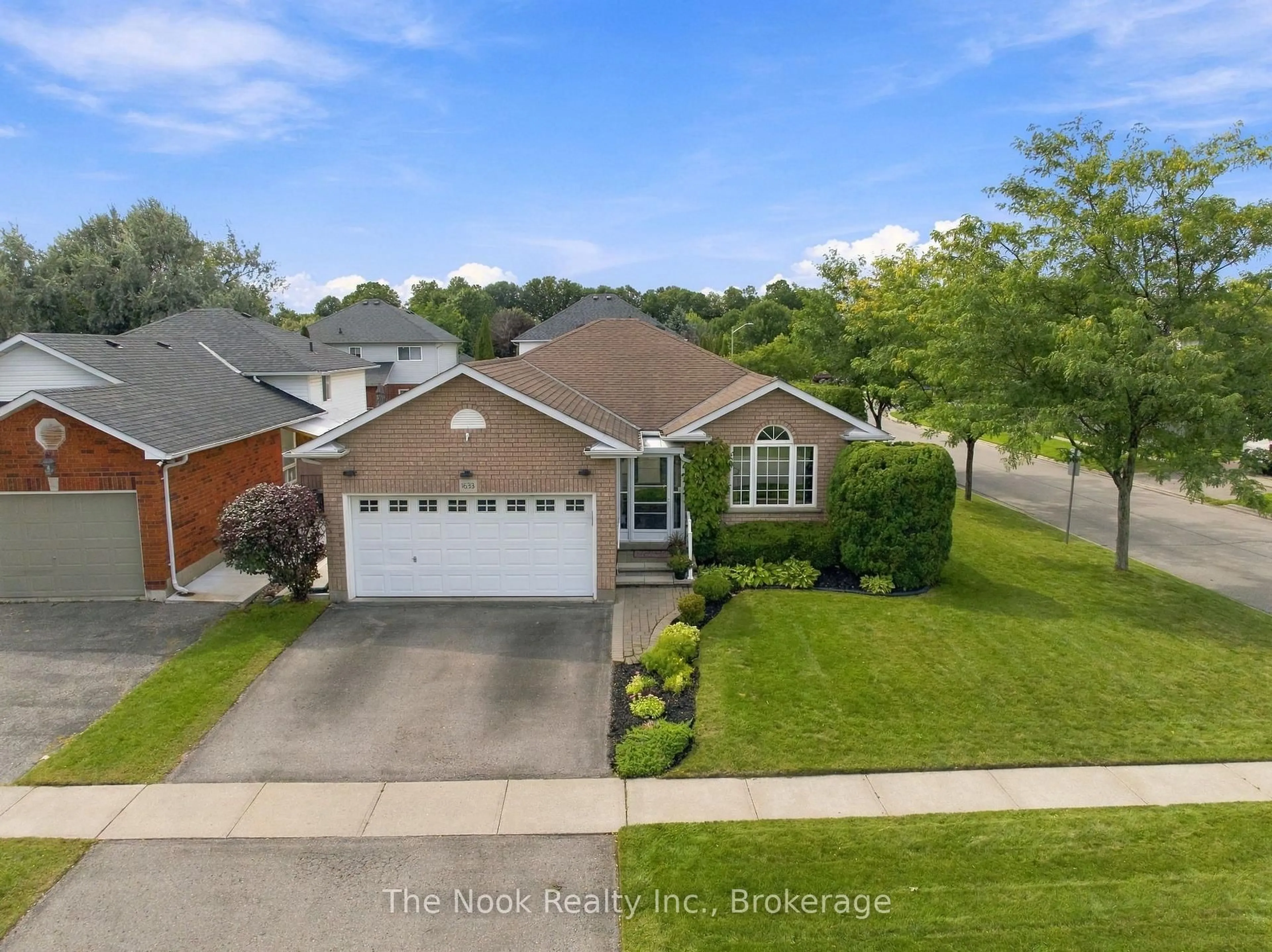A pic from outside/outdoor area/front of a property/back of a property/a pic from drone, water/lake/river/ocean view for 1633 Erindale Cres, Oshawa Ontario L1G 8A4