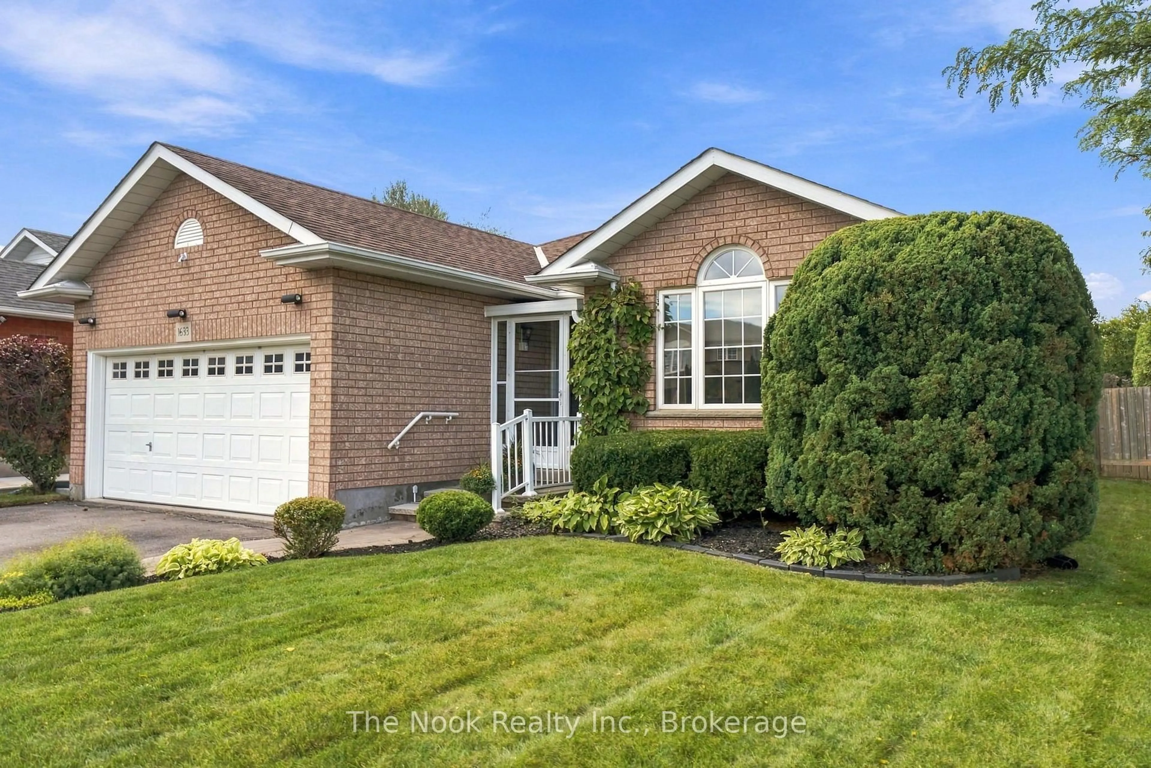 Home with brick exterior material, street for 1633 Erindale Cres, Oshawa Ontario L1G 8A4