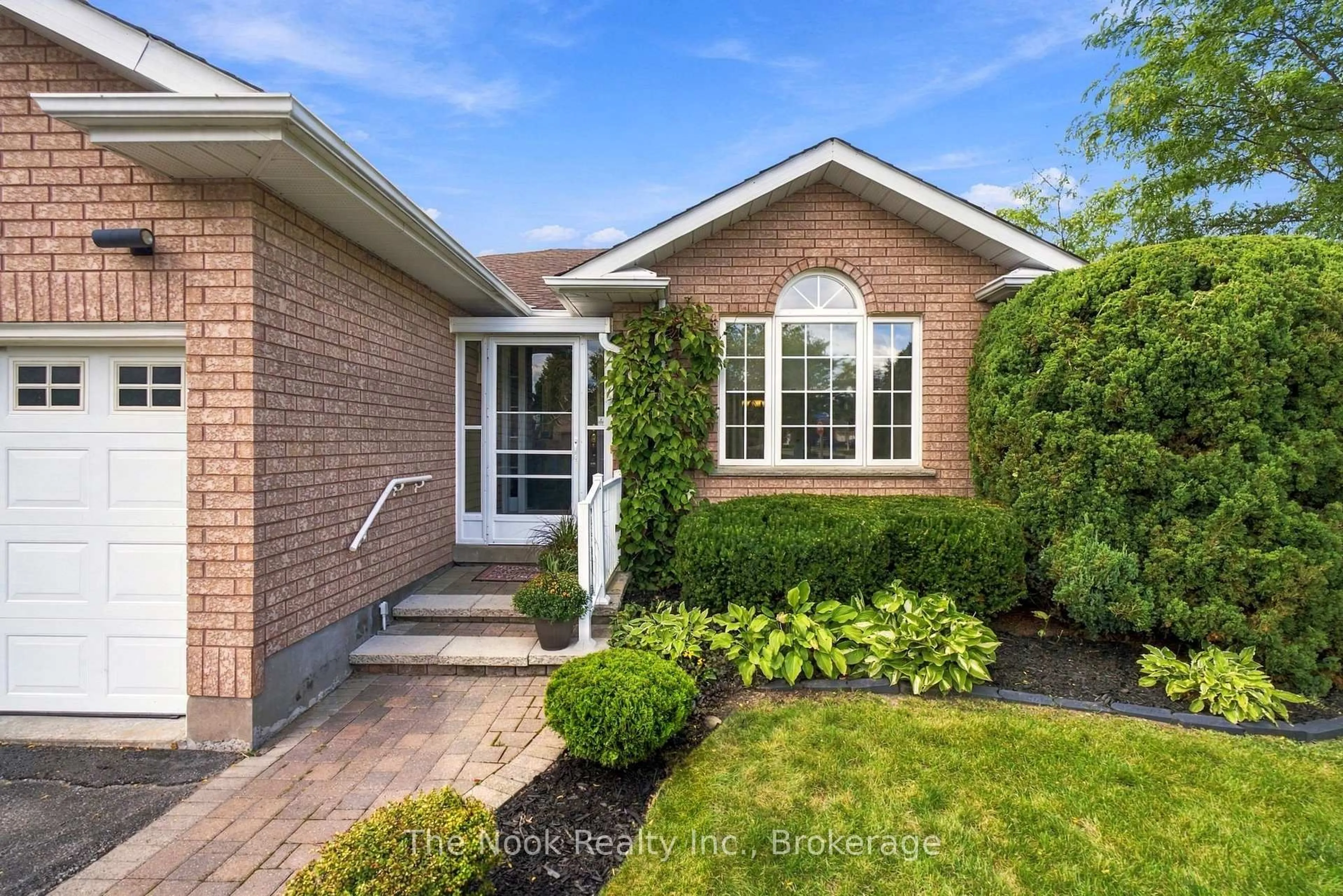 Home with brick exterior material, street for 1633 Erindale Cres, Oshawa Ontario L1G 8A4
