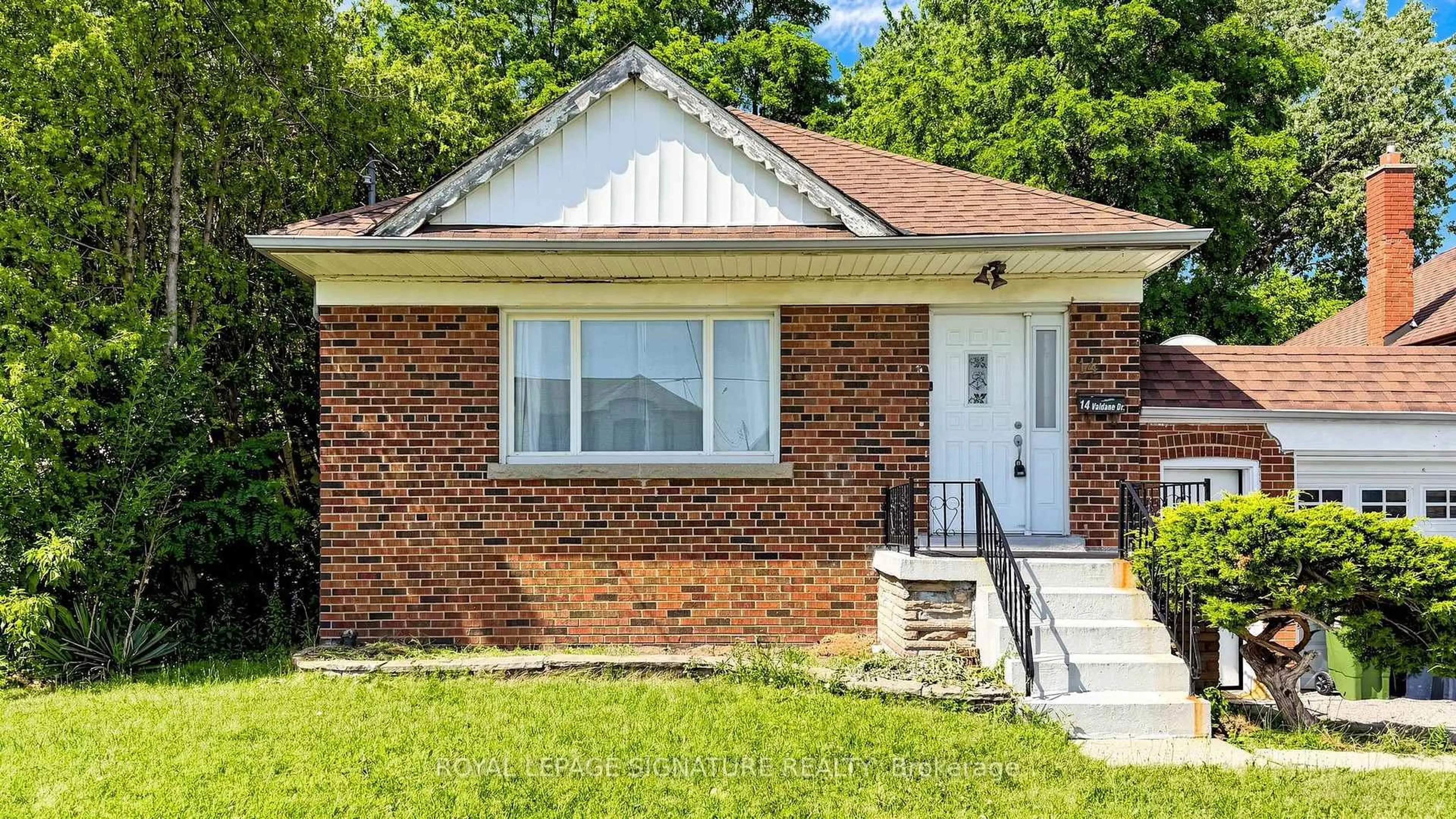 Home with brick exterior material, street for 14 Valdane Dr, Toronto Ontario M1L 2E9