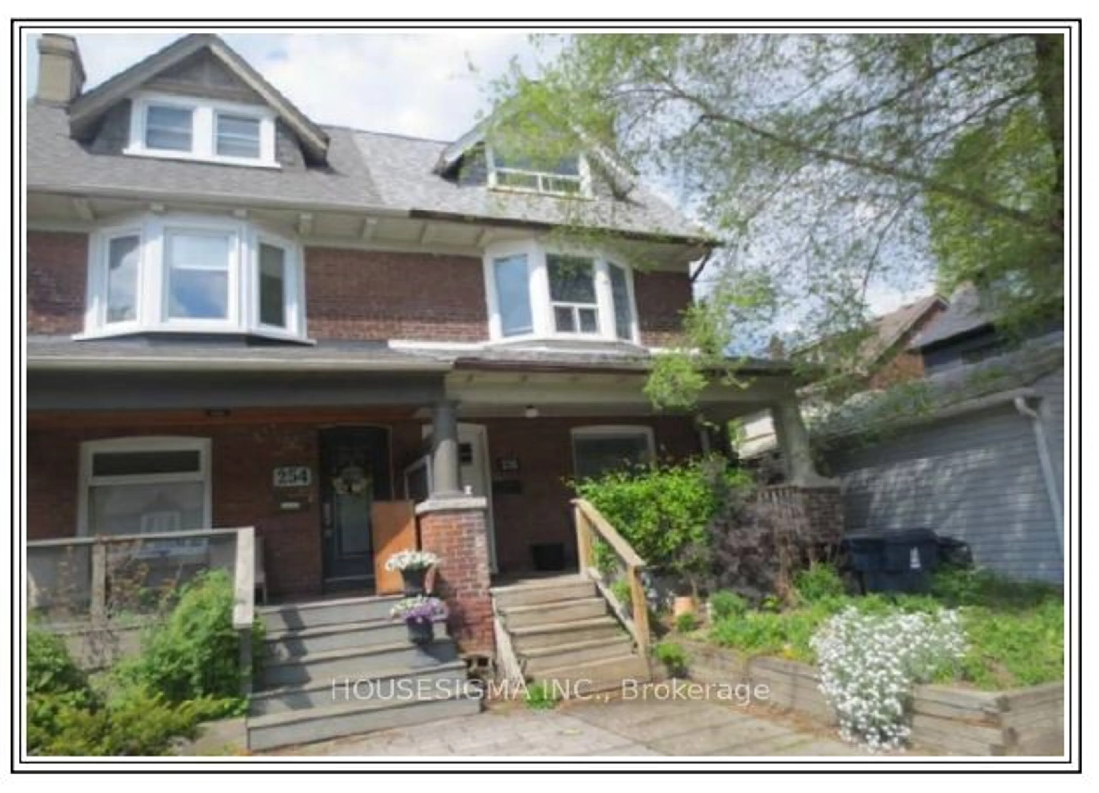 Frontside or backside of a home for 256 Woodbine Ave, Toronto Ontario M4L 3P2