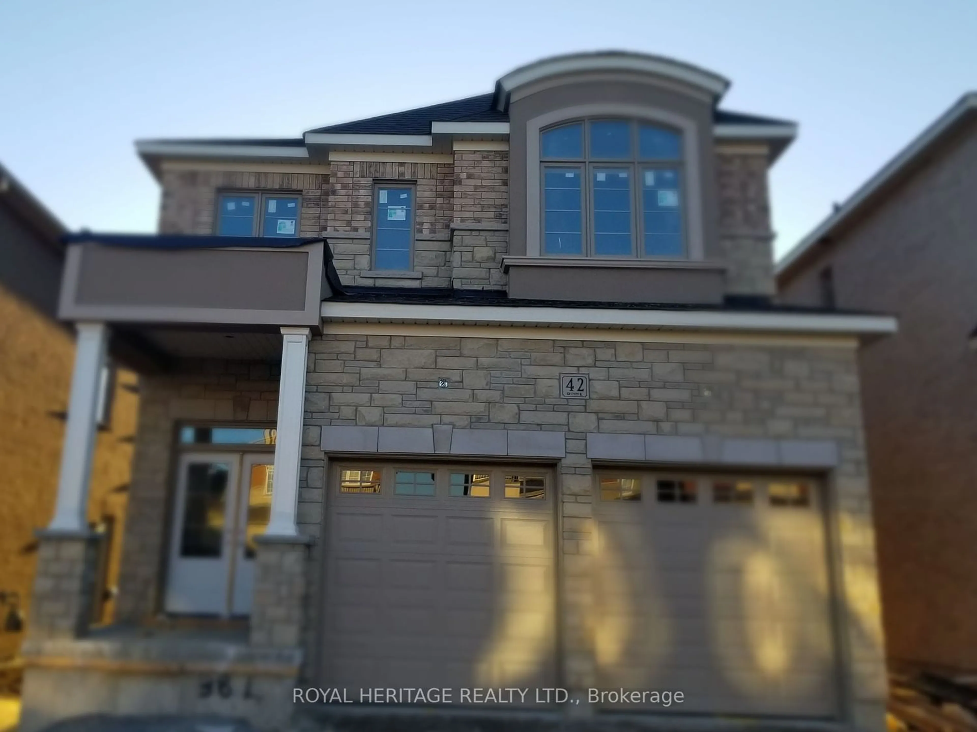 Home with brick exterior material for 42 St Augustine Dr, Whitby Ontario L1M 0L7