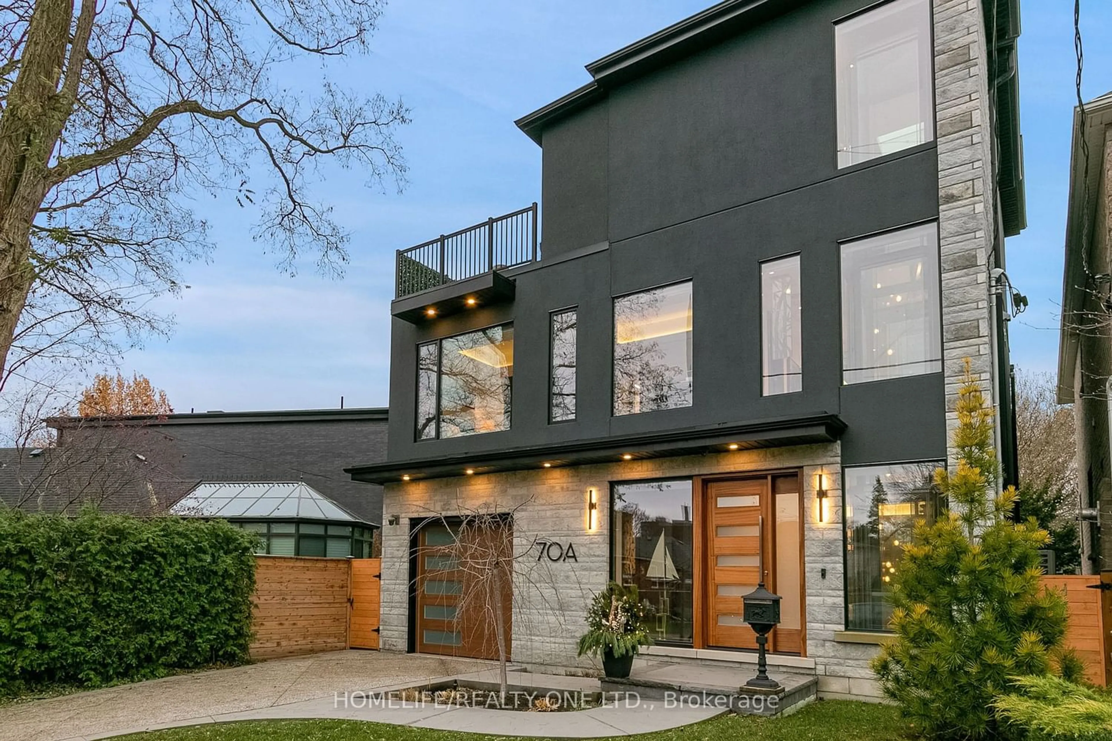 Home with stucco exterior material for 70A Hillside Dr, Toronto Ontario M4K 2M6