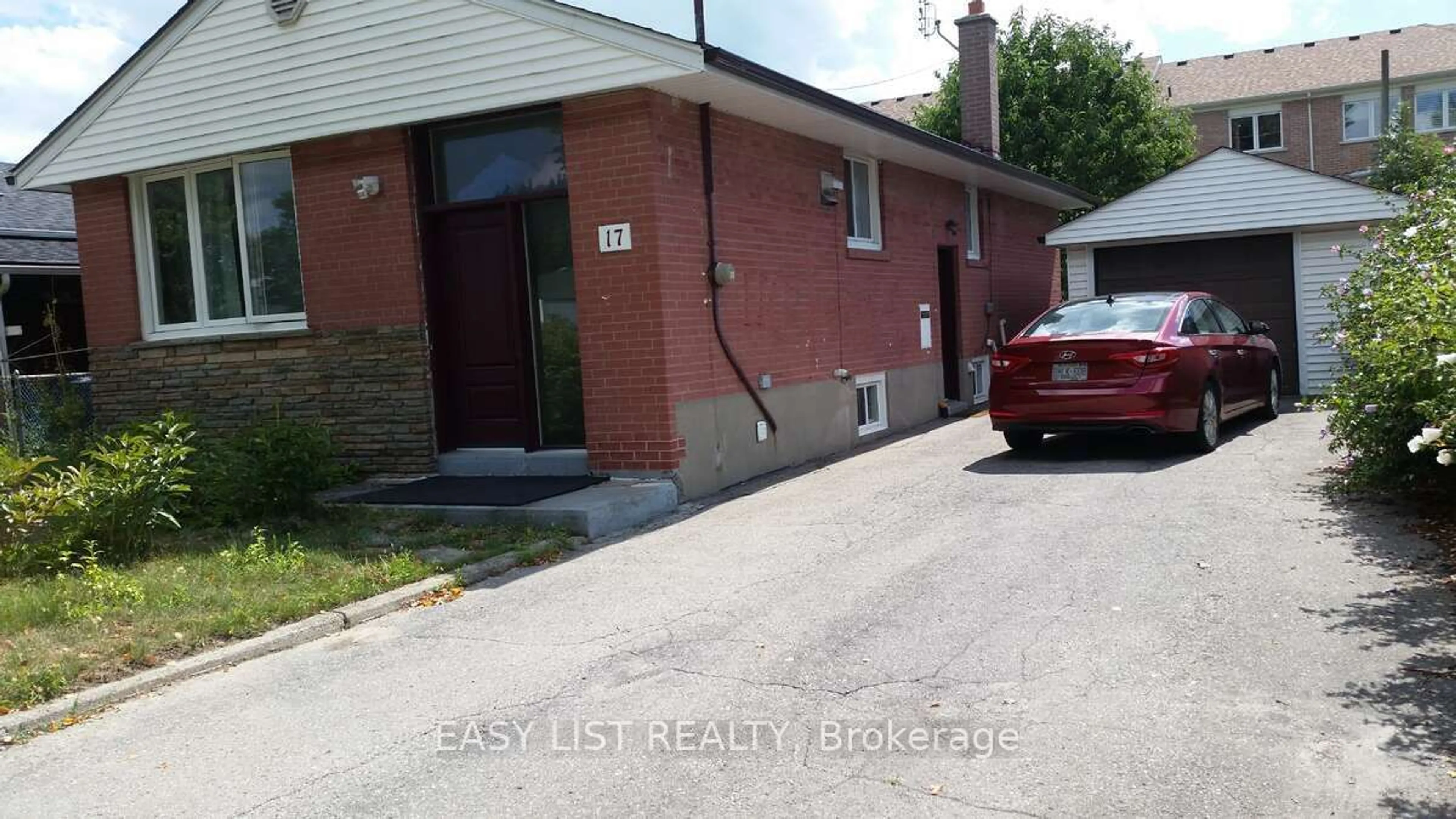 Frontside or backside of a home for 17 Savarin St, Toronto Ontario M1J 1Z7