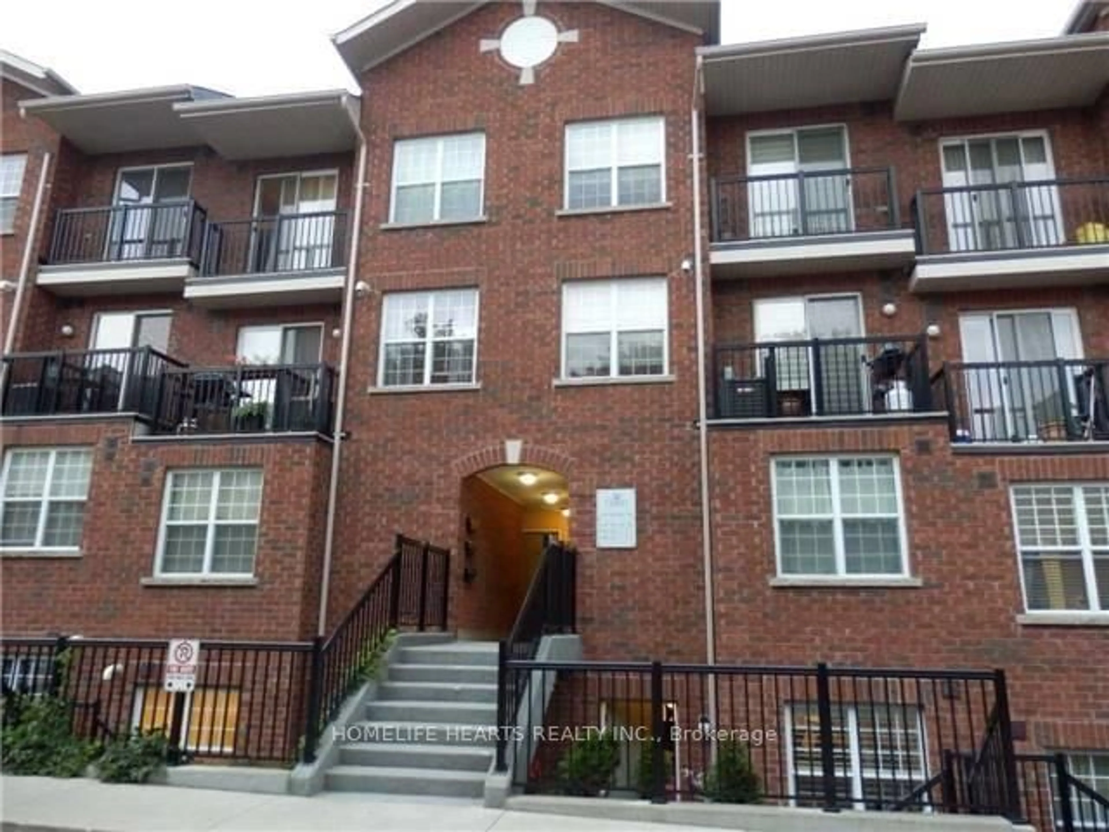 A pic from exterior of the house or condo for 15 Strangford Lane #312, Toronto Ontario M1L 0E5