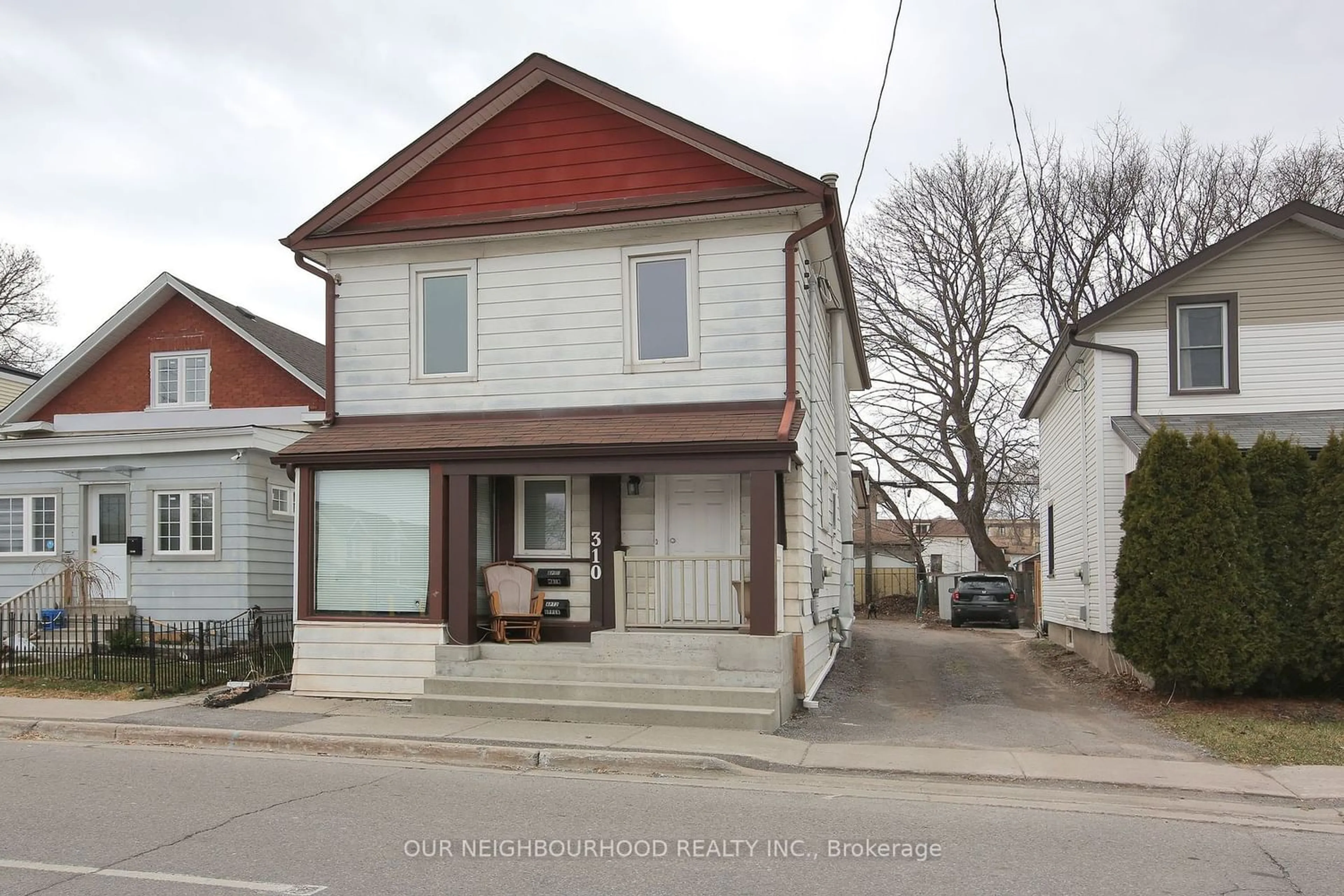 Frontside or backside of a home for 310 Albert St, Oshawa Ontario L1H 4R8