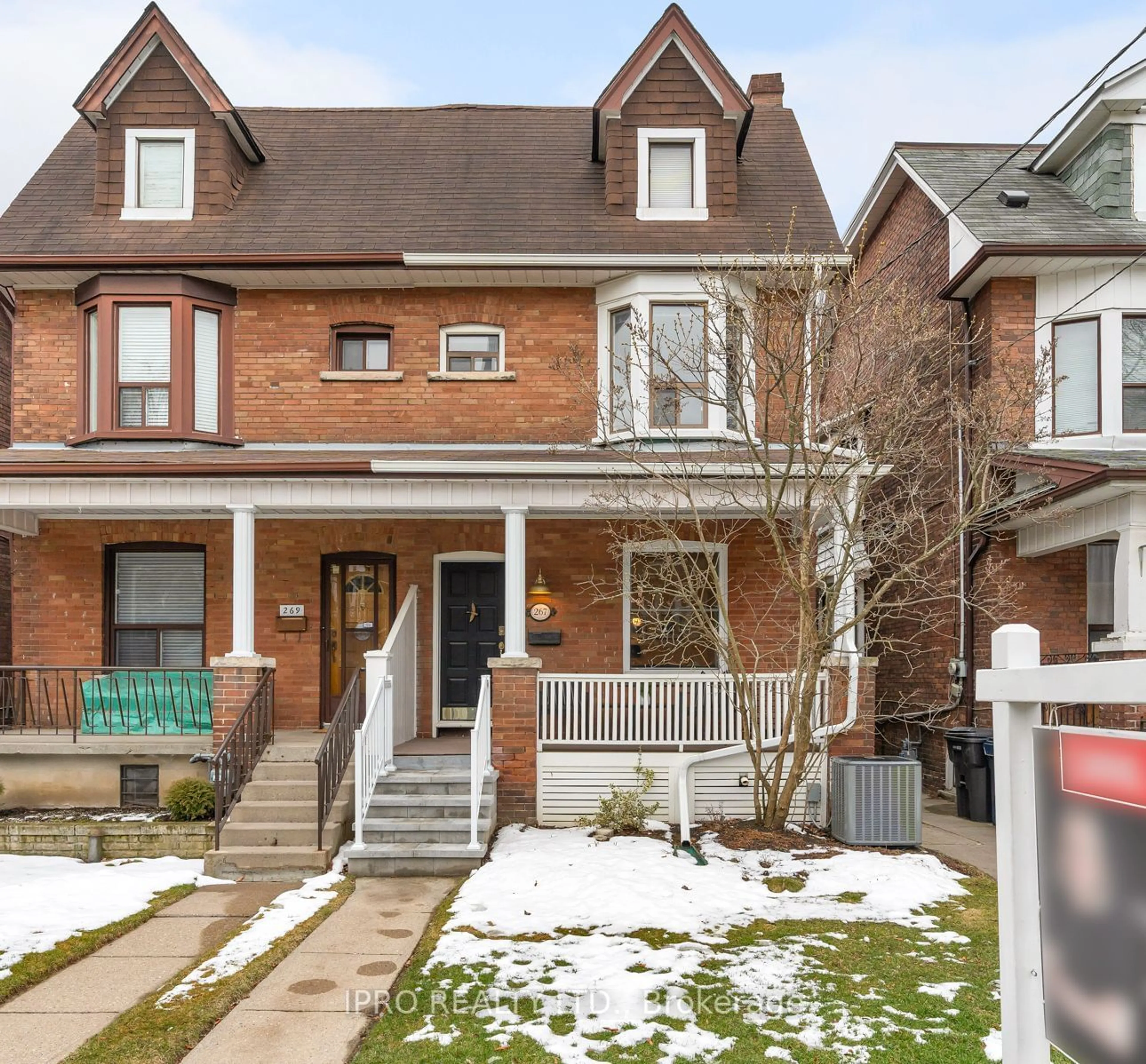 Home with brick exterior material for 267 Strathmore Blvd, Toronto Ontario M4J 1P7