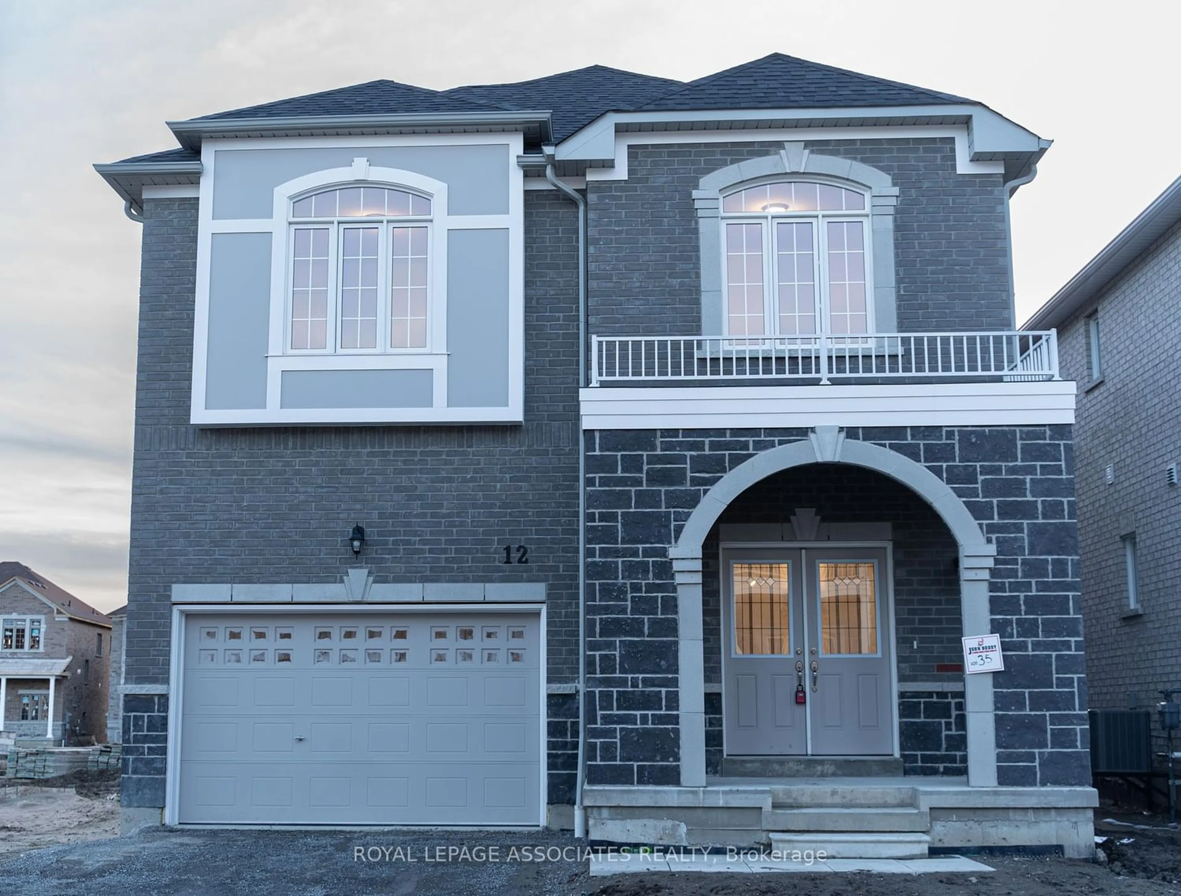 Home with brick exterior material for 12 Creedon Cres, Ajax Ontario L1T 0P7
