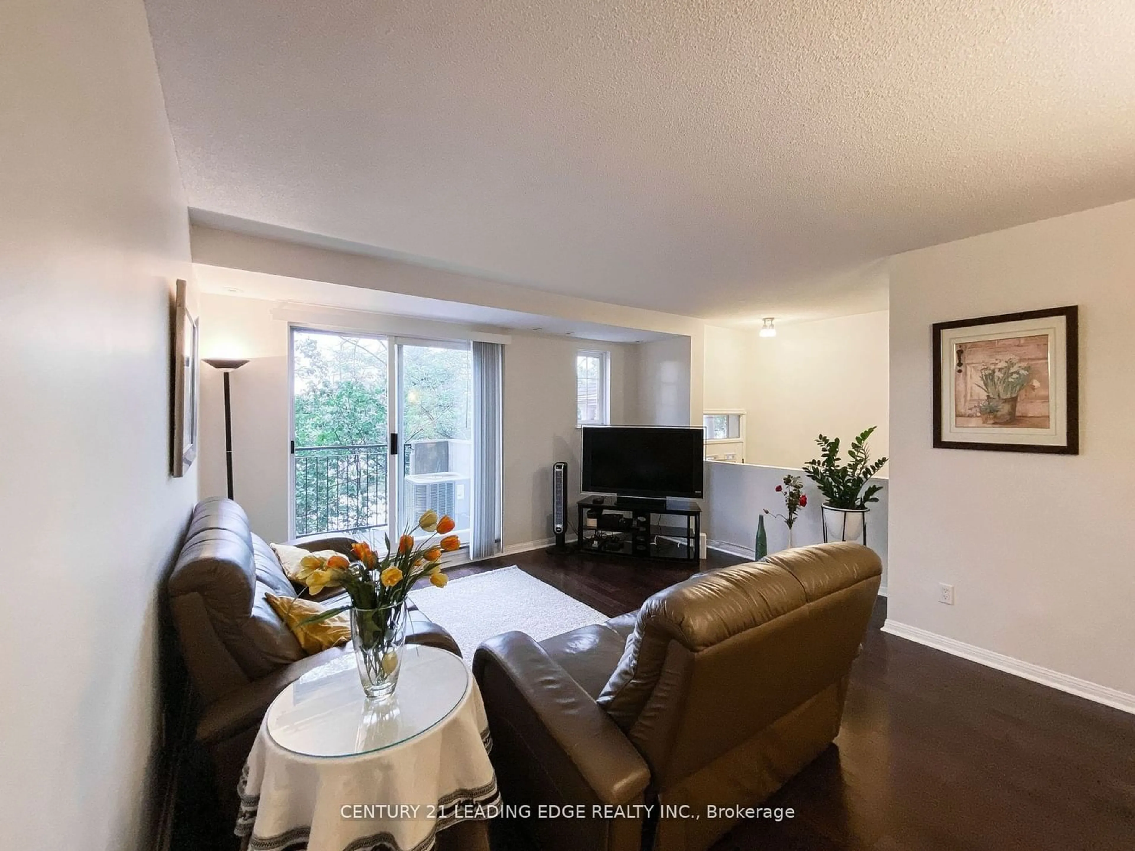 Living room for 1881 Mcnicoll Ave #228, Toronto Ontario M1V 5M2