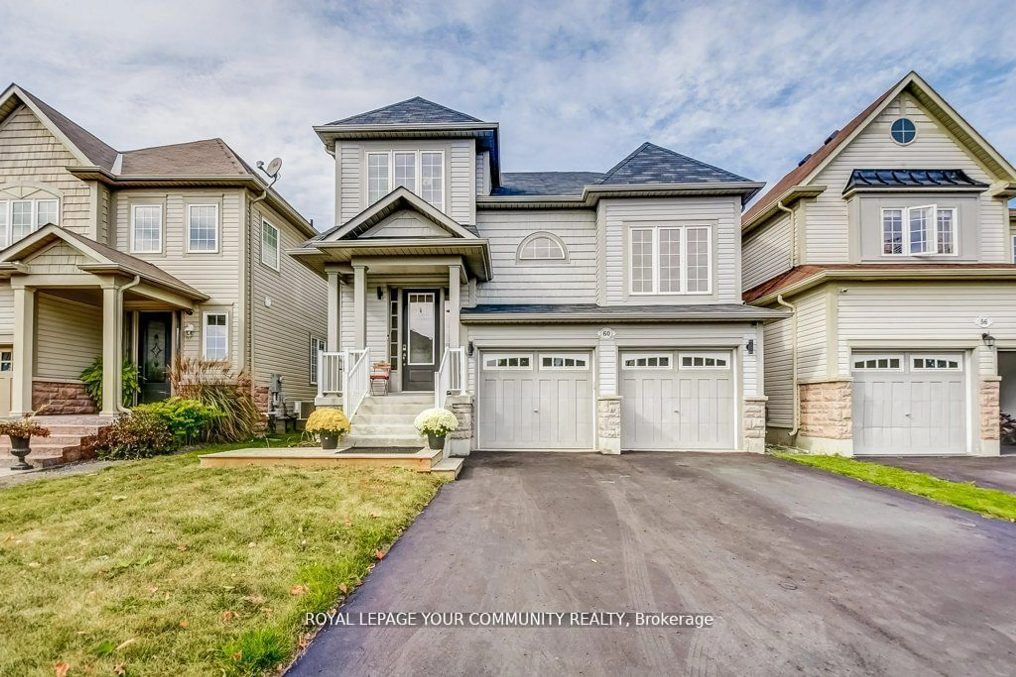 Frontside or backside of a home for 60 Milligan St, Clarington Ontario L1B 0B5