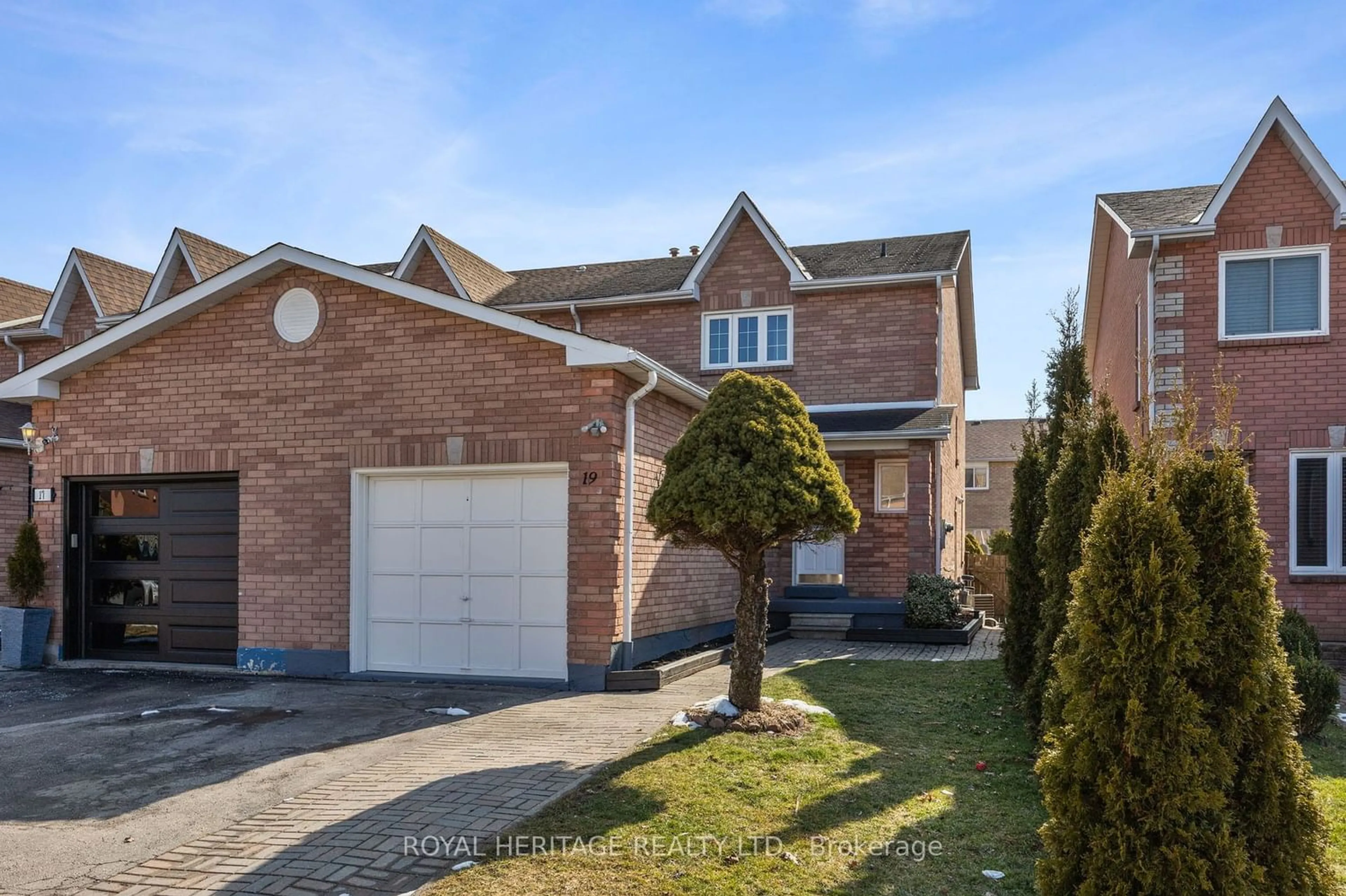 Frontside or backside of a home for 19 Weekes Dr, Ajax Ontario L1T 3T3