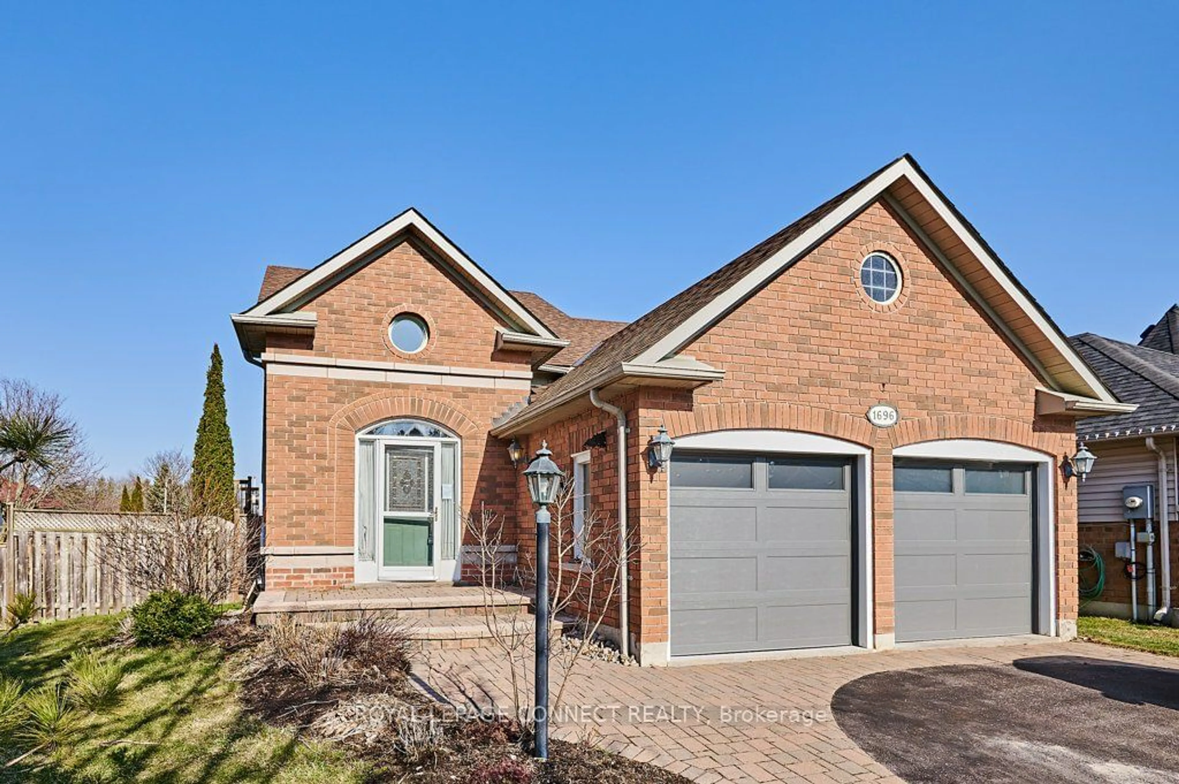Home with brick exterior material for 1696 Edenwood Dr, Oshawa Ontario L1G 7Y5