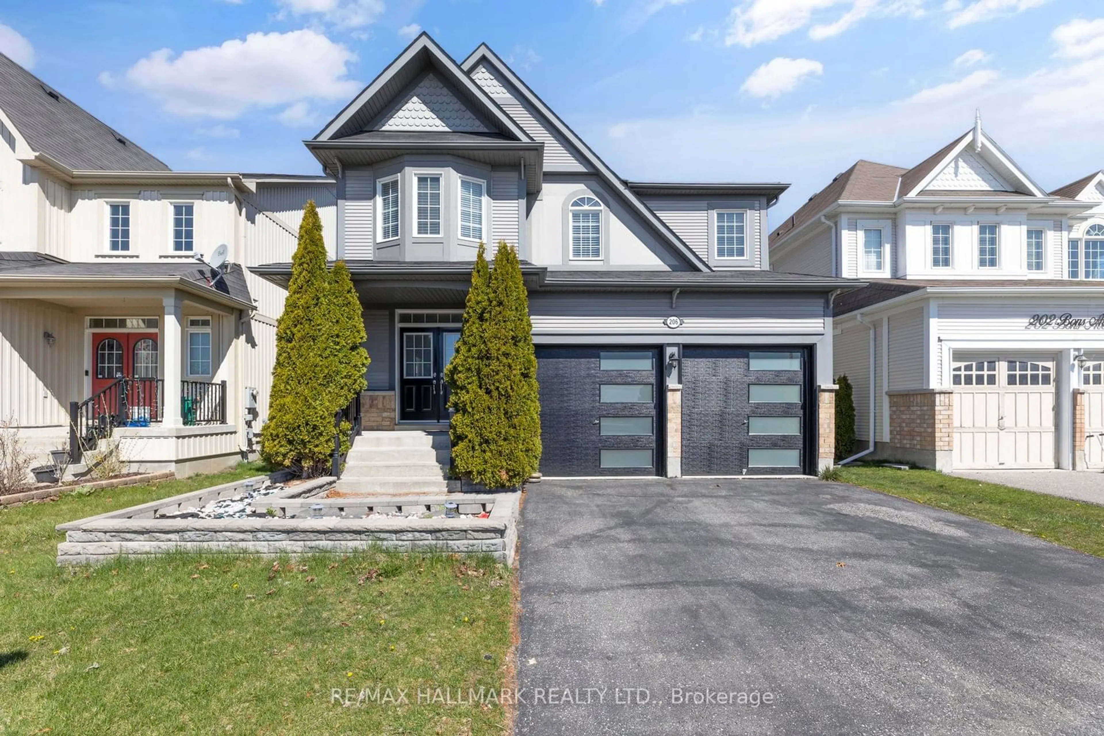 Frontside or backside of a home for 206 Bons Ave, Clarington Ontario L1C 0H8