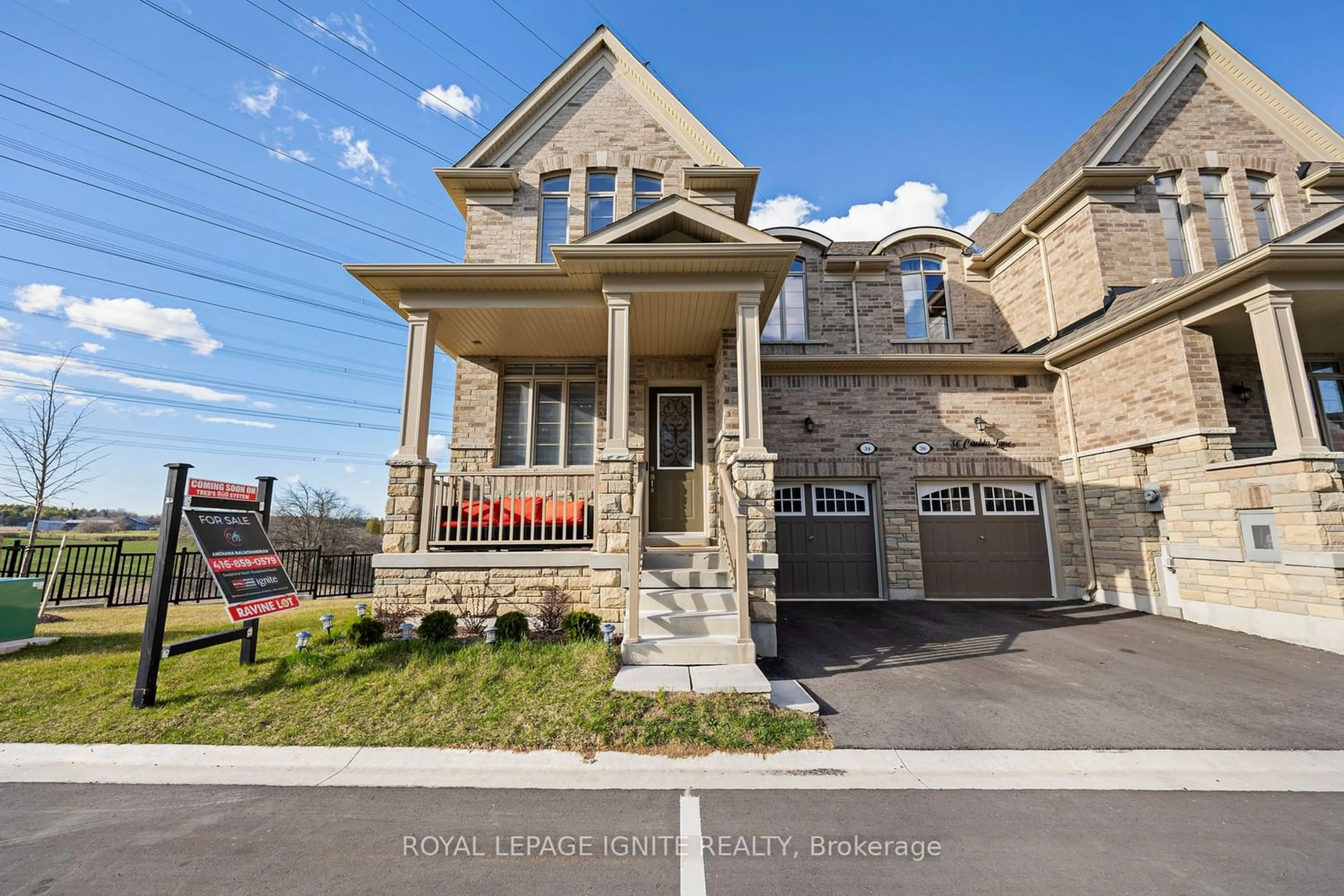 Frontside or backside of a home for 34 Cachia Lane, Ajax Ontario L1T 0P8