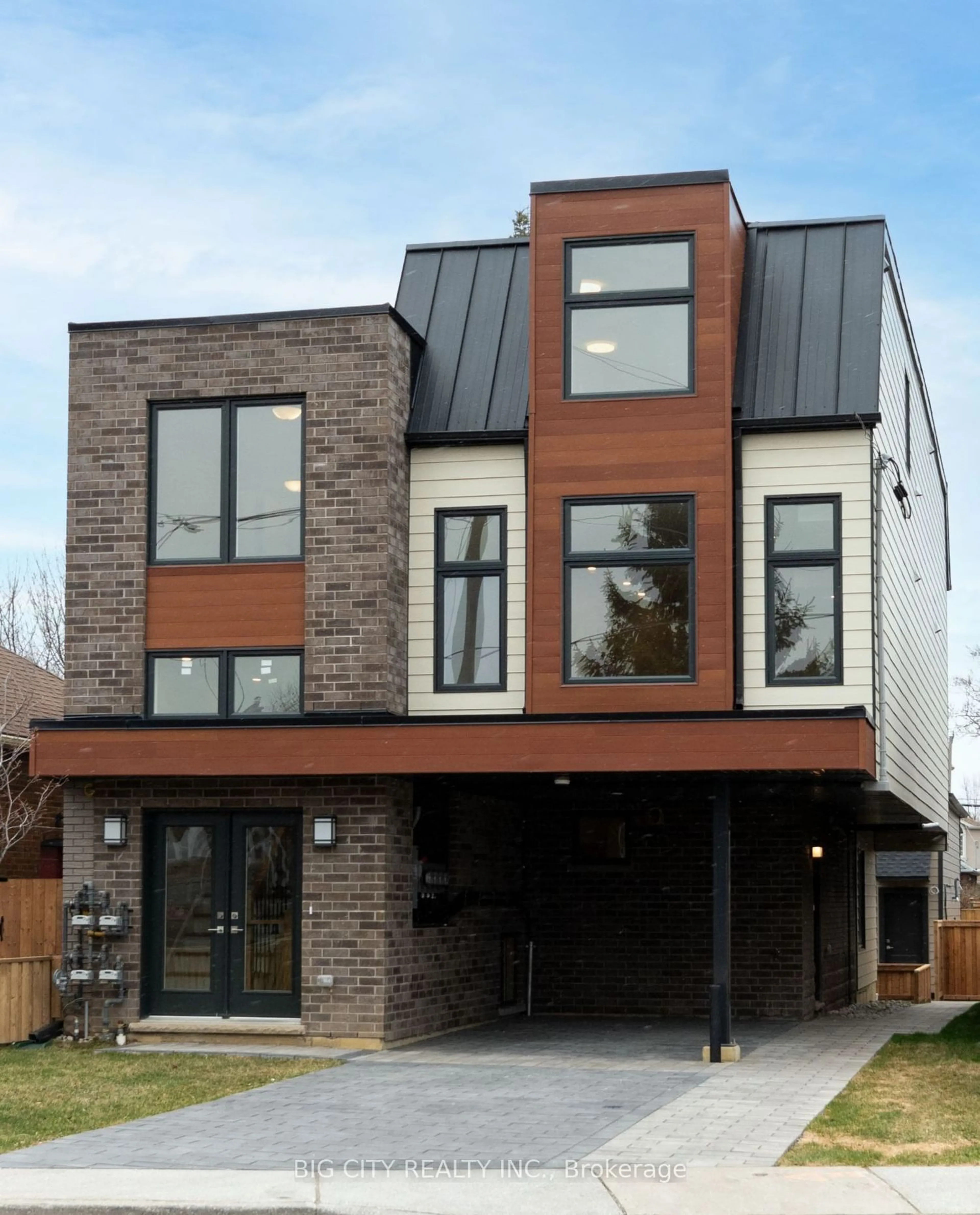 Home with brick exterior material for 319 Mortimer Ave #Suite 3, Toronto Ontario M4J 2C9
