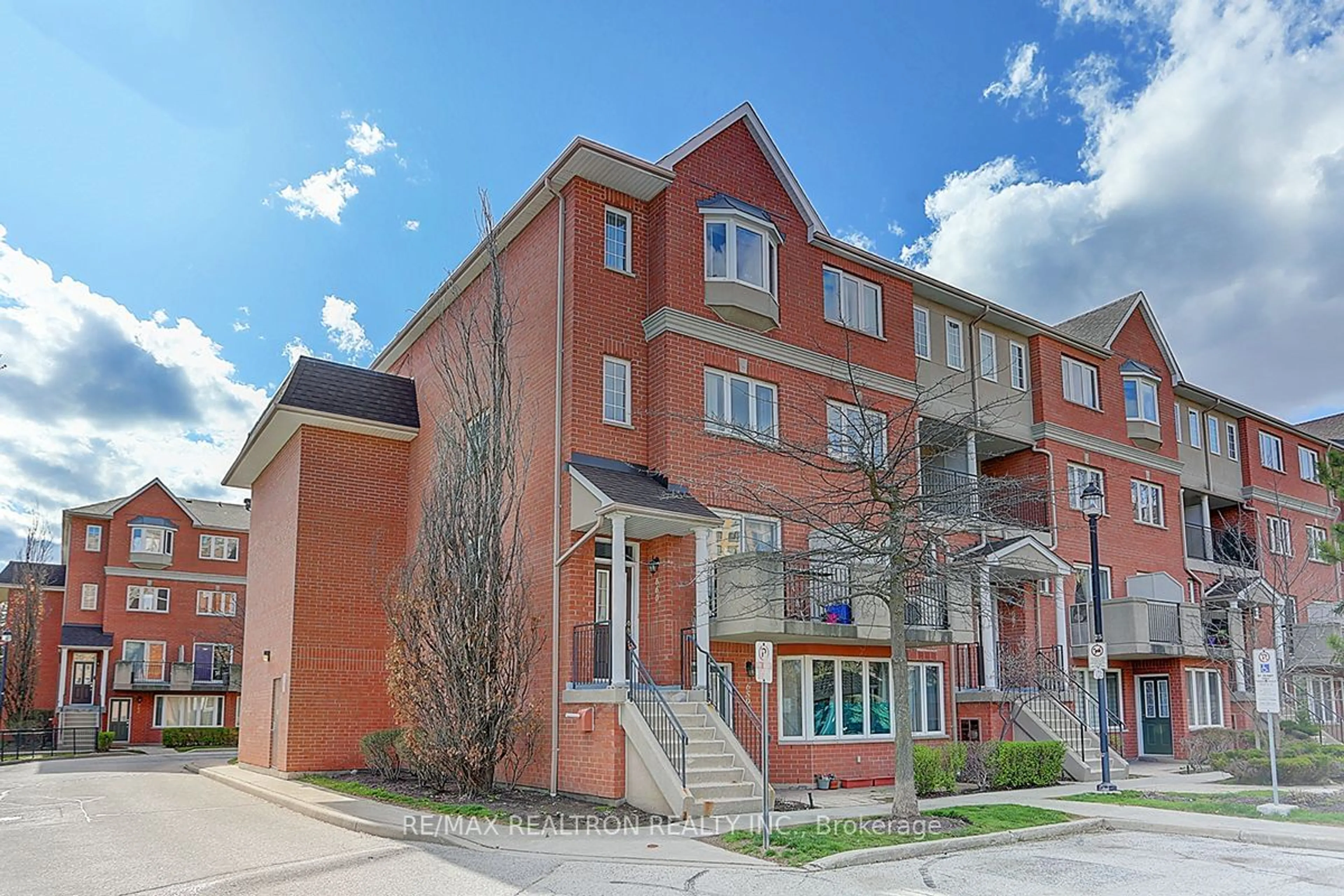 A pic from exterior of the house or condo for 1881 Mcnicoll Ave #660, Toronto Ontario M1V 5M2