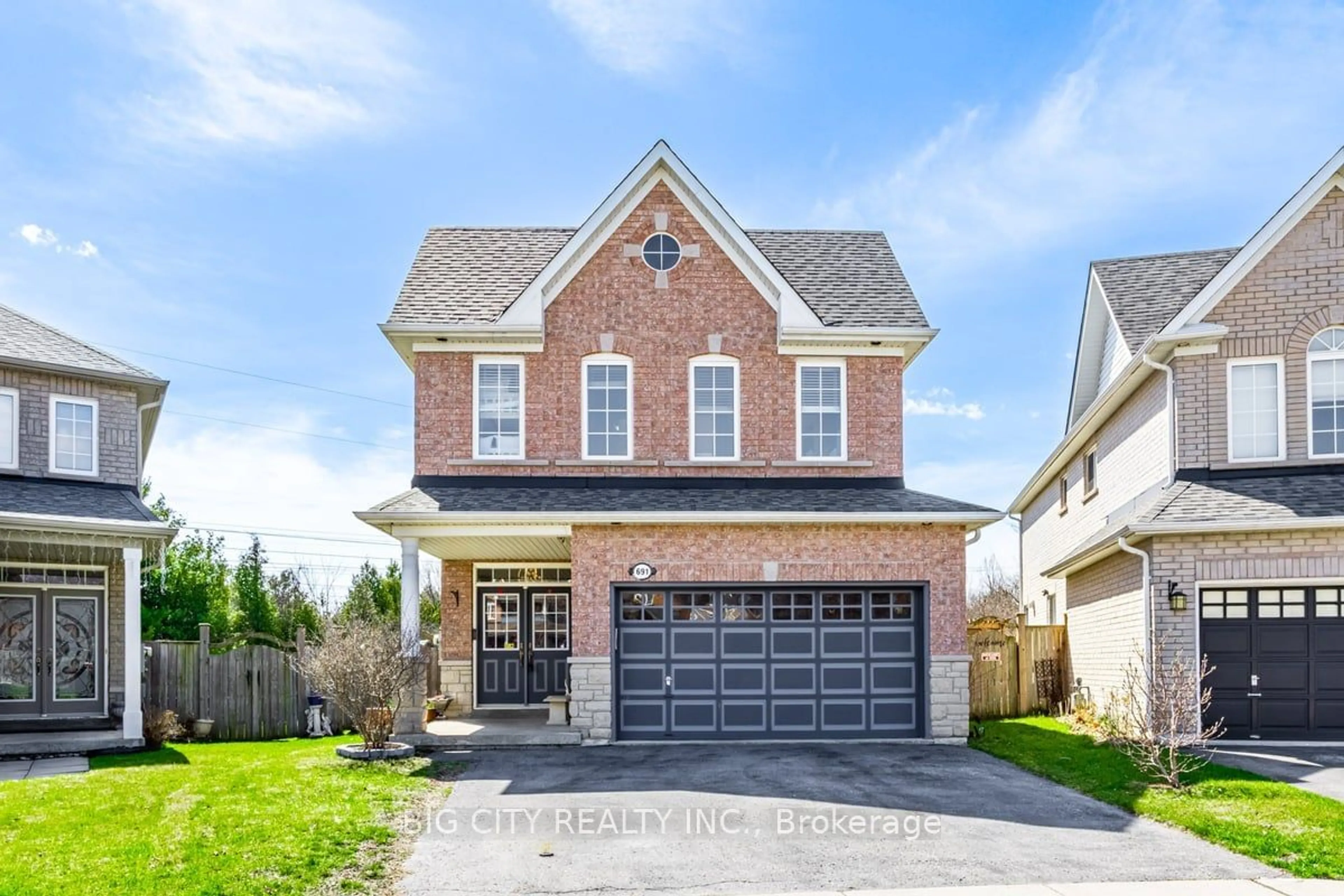 Home with brick exterior material for 691 Sunbird Tr, Pickering Ontario L1X 2X7