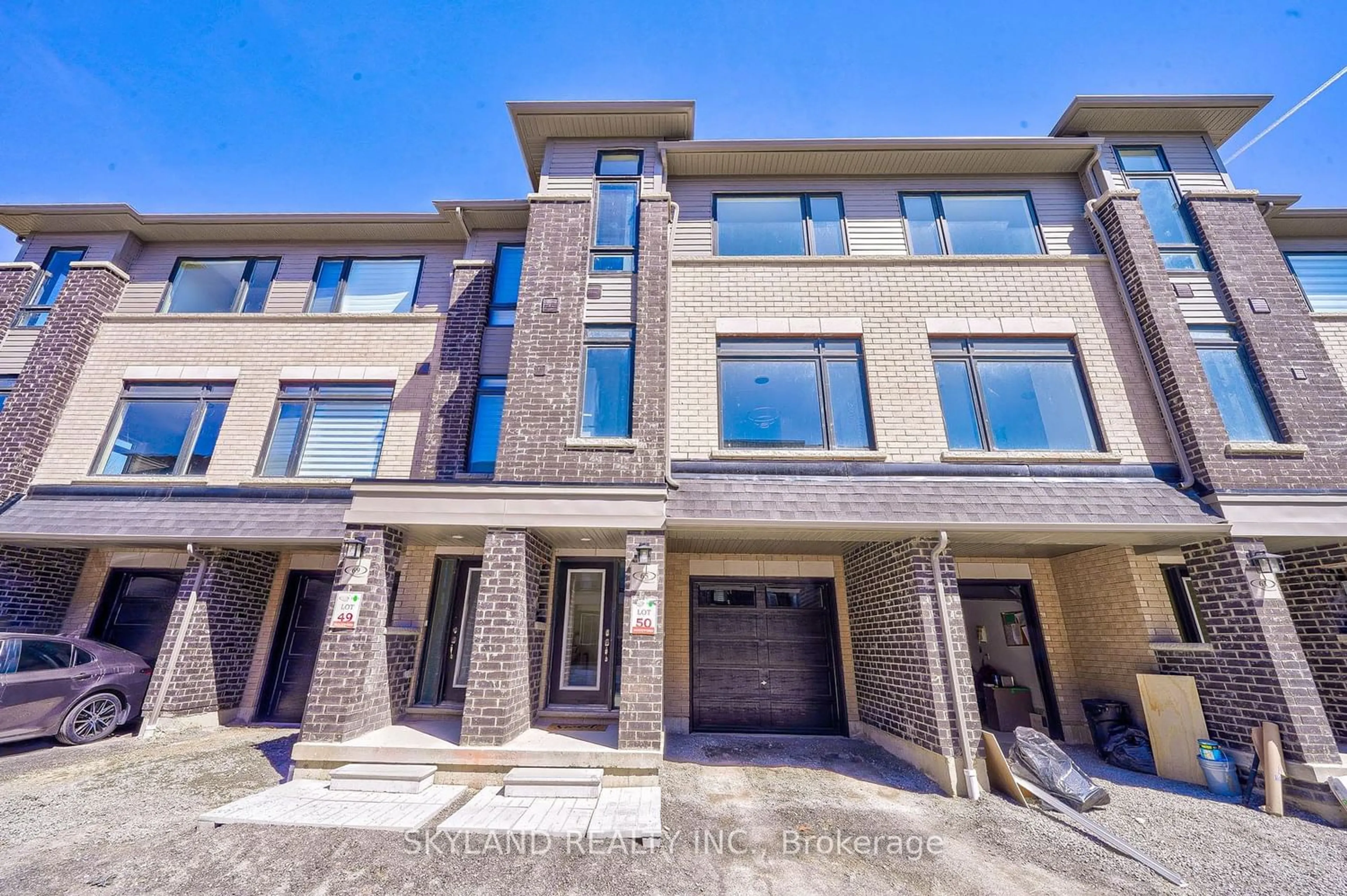 A pic from exterior of the house or condo for 65 Emmas Way, Whitby Ontario L1R 3K4