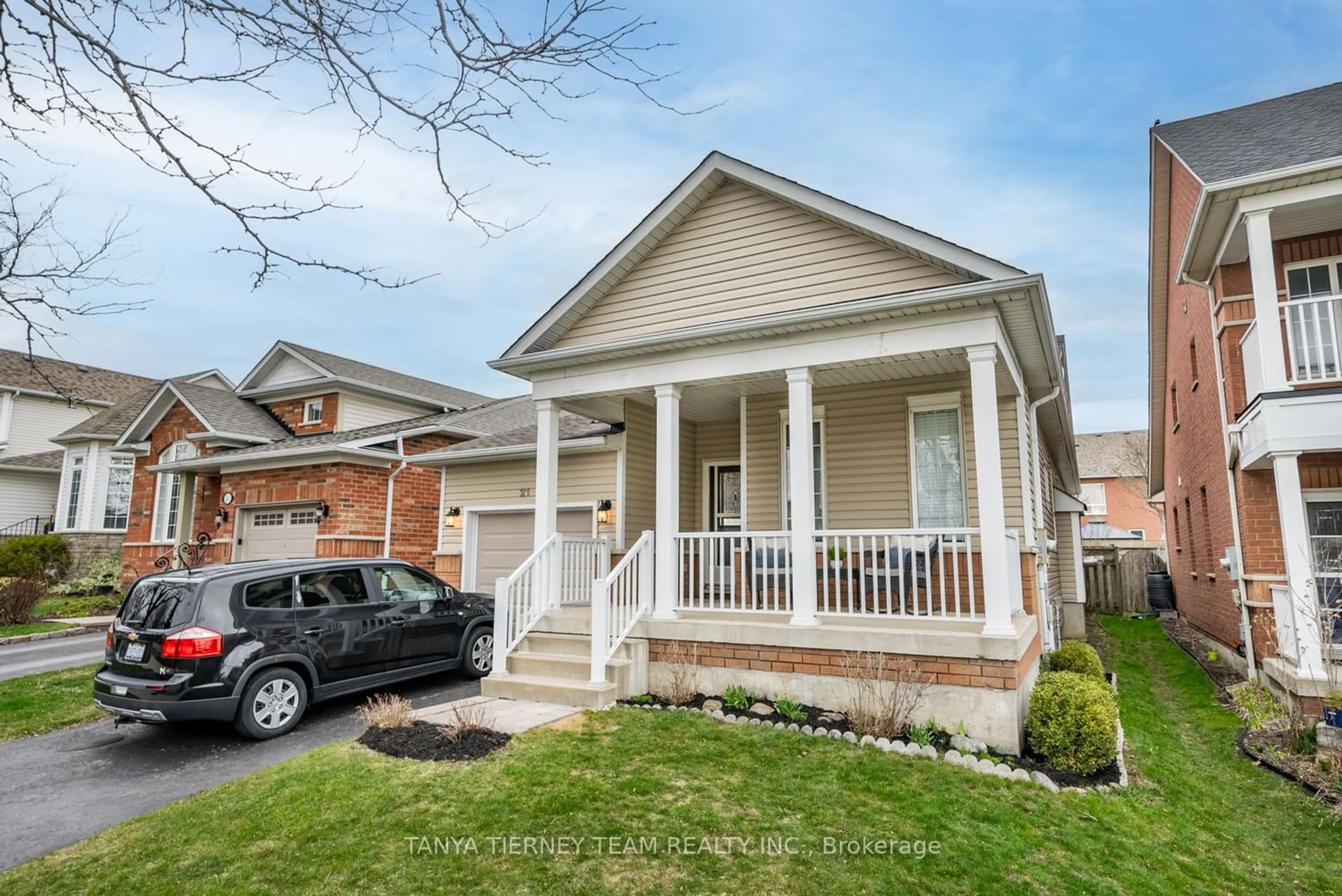 Frontside or backside of a home for 21 Melody Dr, Whitby Ontario L1M 1K4