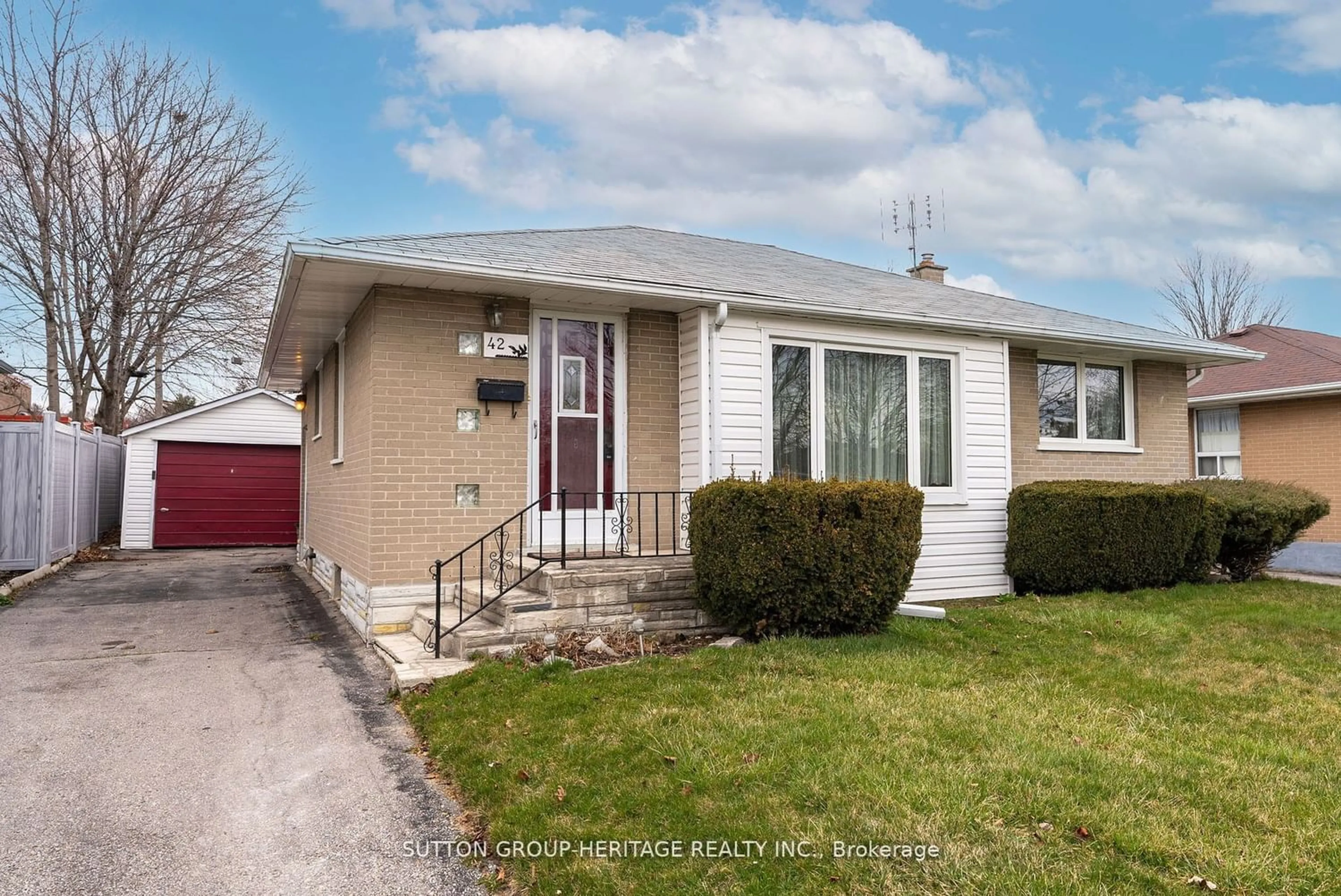 Frontside or backside of a home for 42 Rideout St, Ajax Ontario L1S 1P8