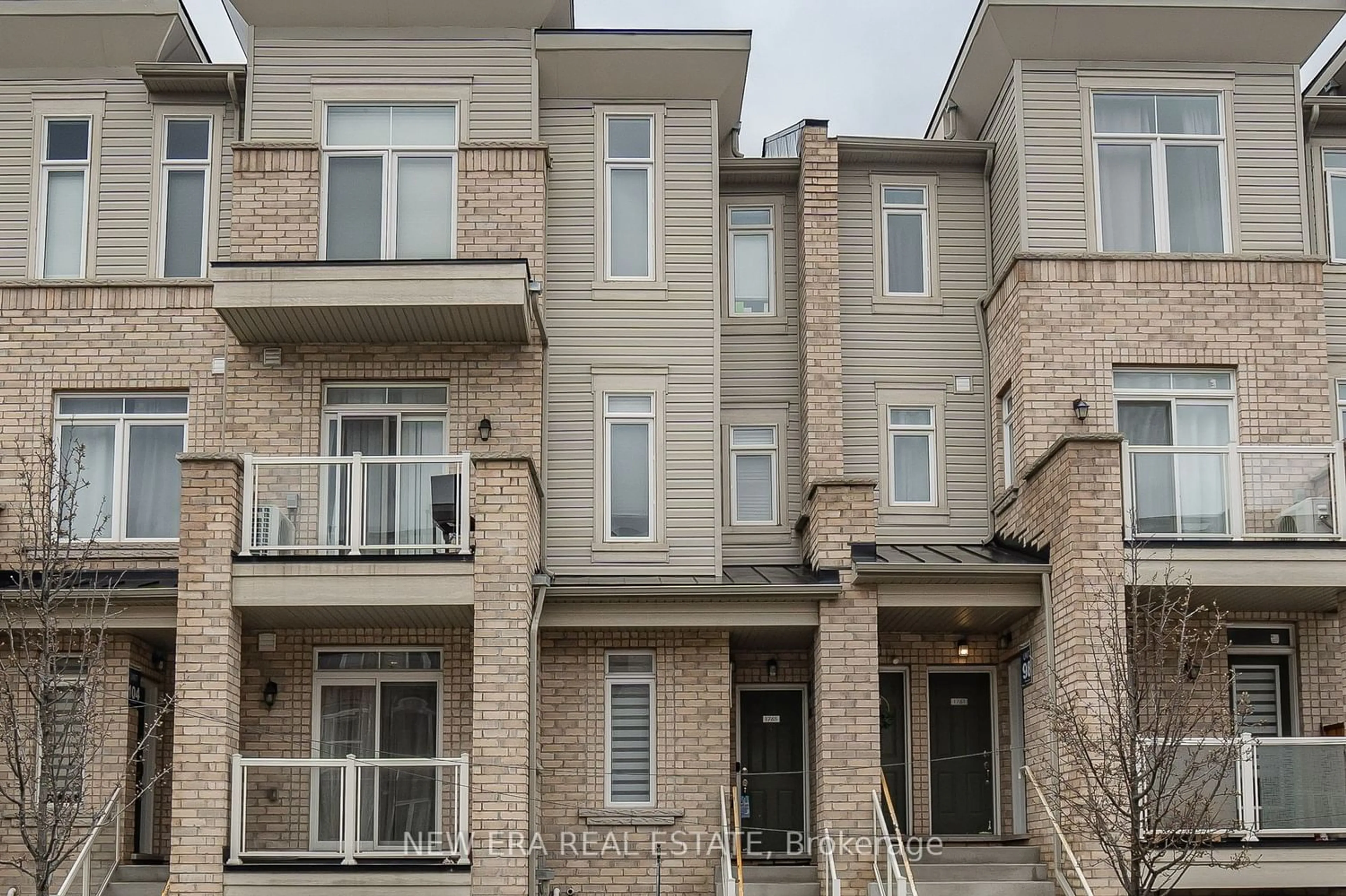 A pic from exterior of the house or condo for 1767 Rex Heath Dr #102, Pickering Ontario L1X 0E4