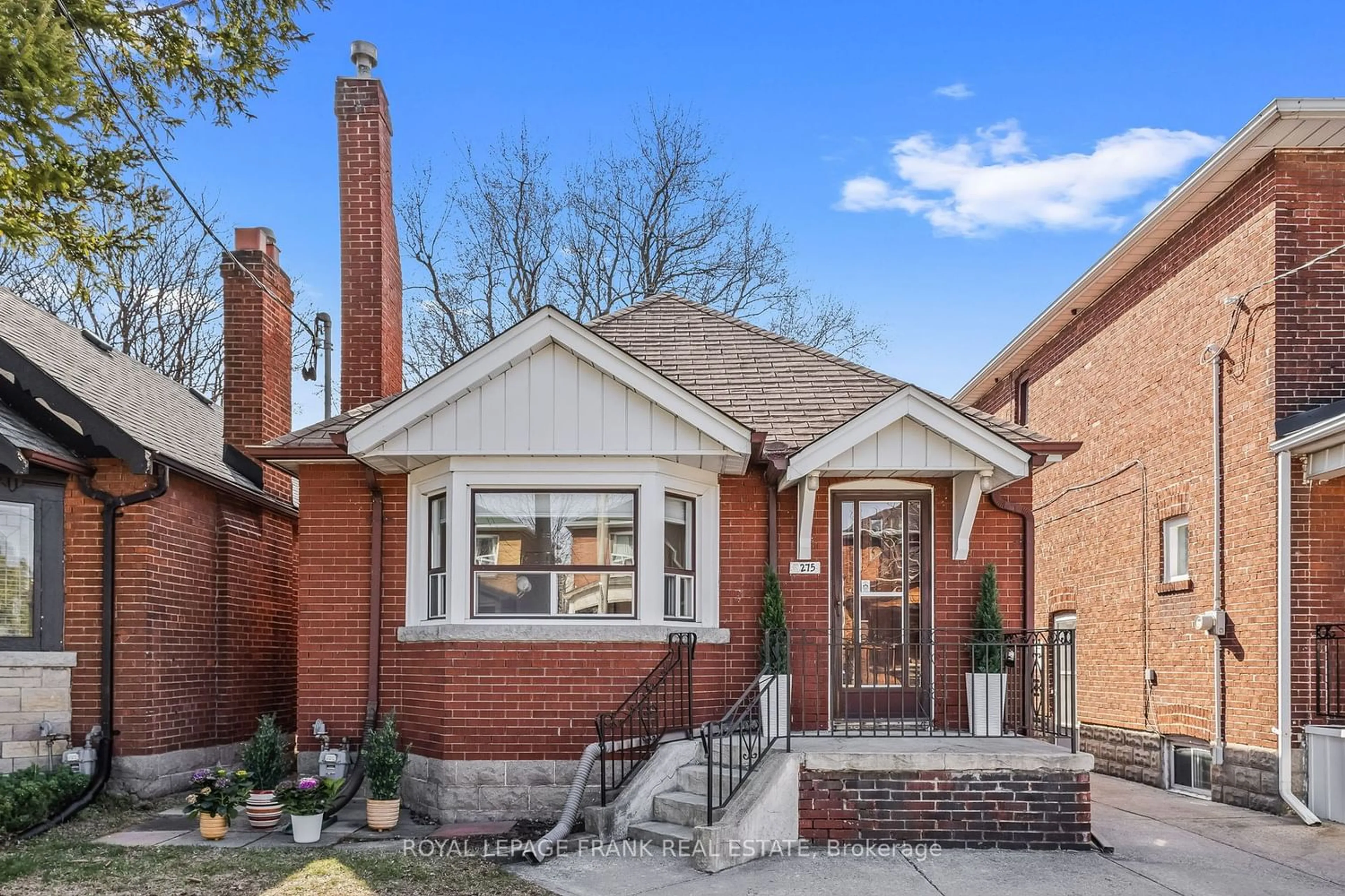 Home with brick exterior material for 275 Mortimer Ave, Toronto Ontario M4J 2C6