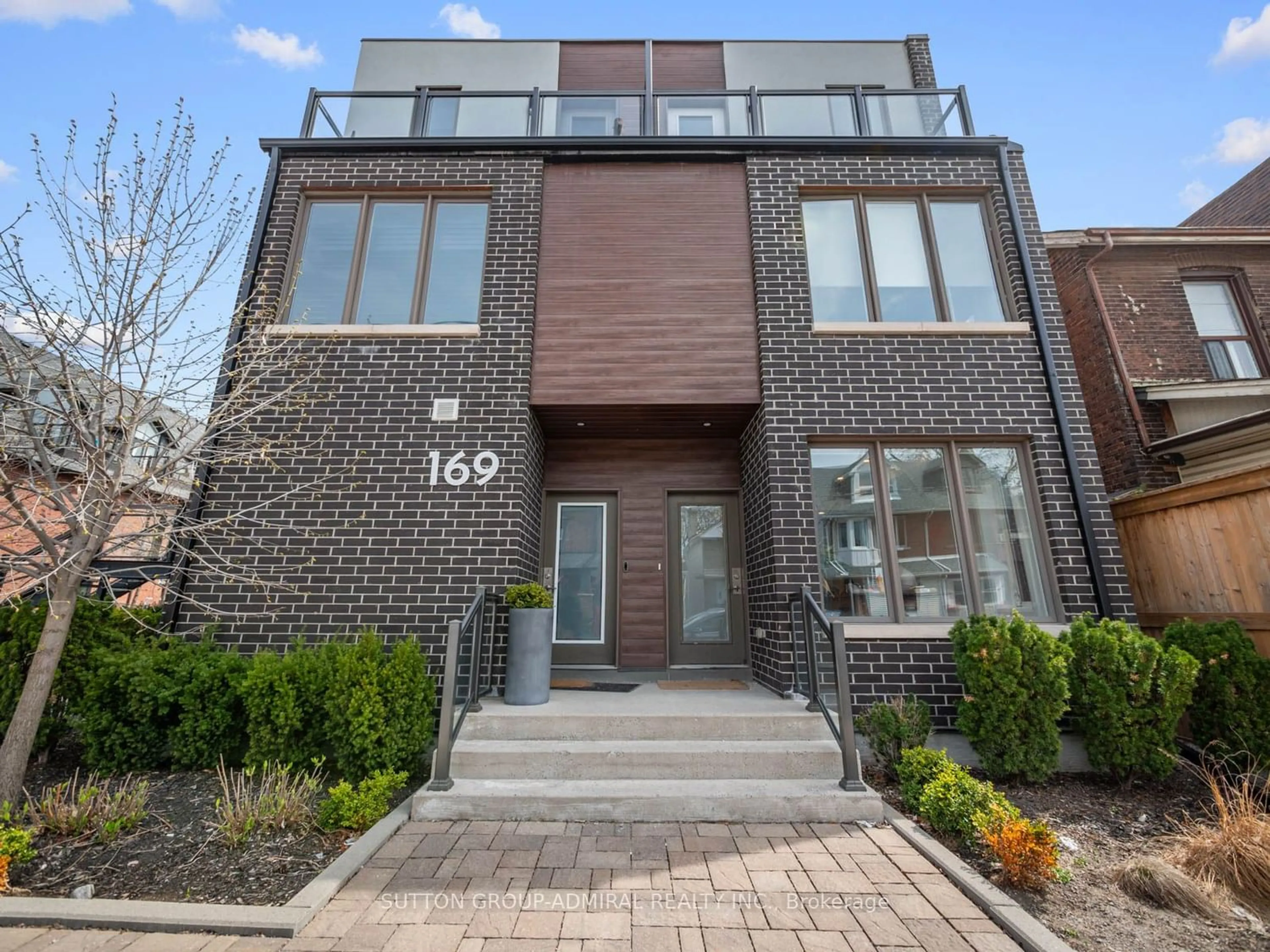 Home with brick exterior material for 169 Jones Ave #11, Toronto Ontario M4M 3A2