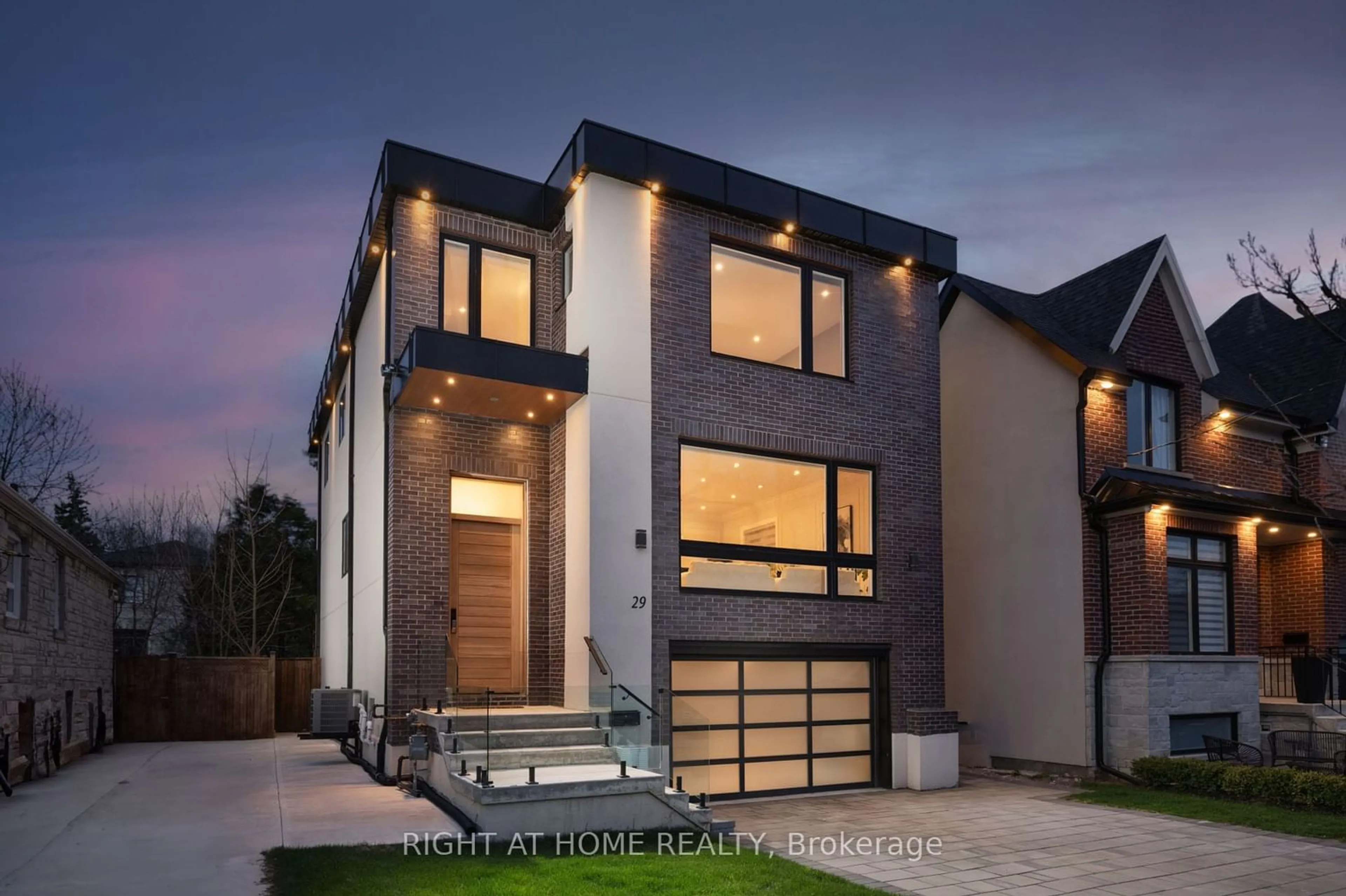 Home with brick exterior material for 29 Machockie Rd, Toronto Ontario M4C 3M5