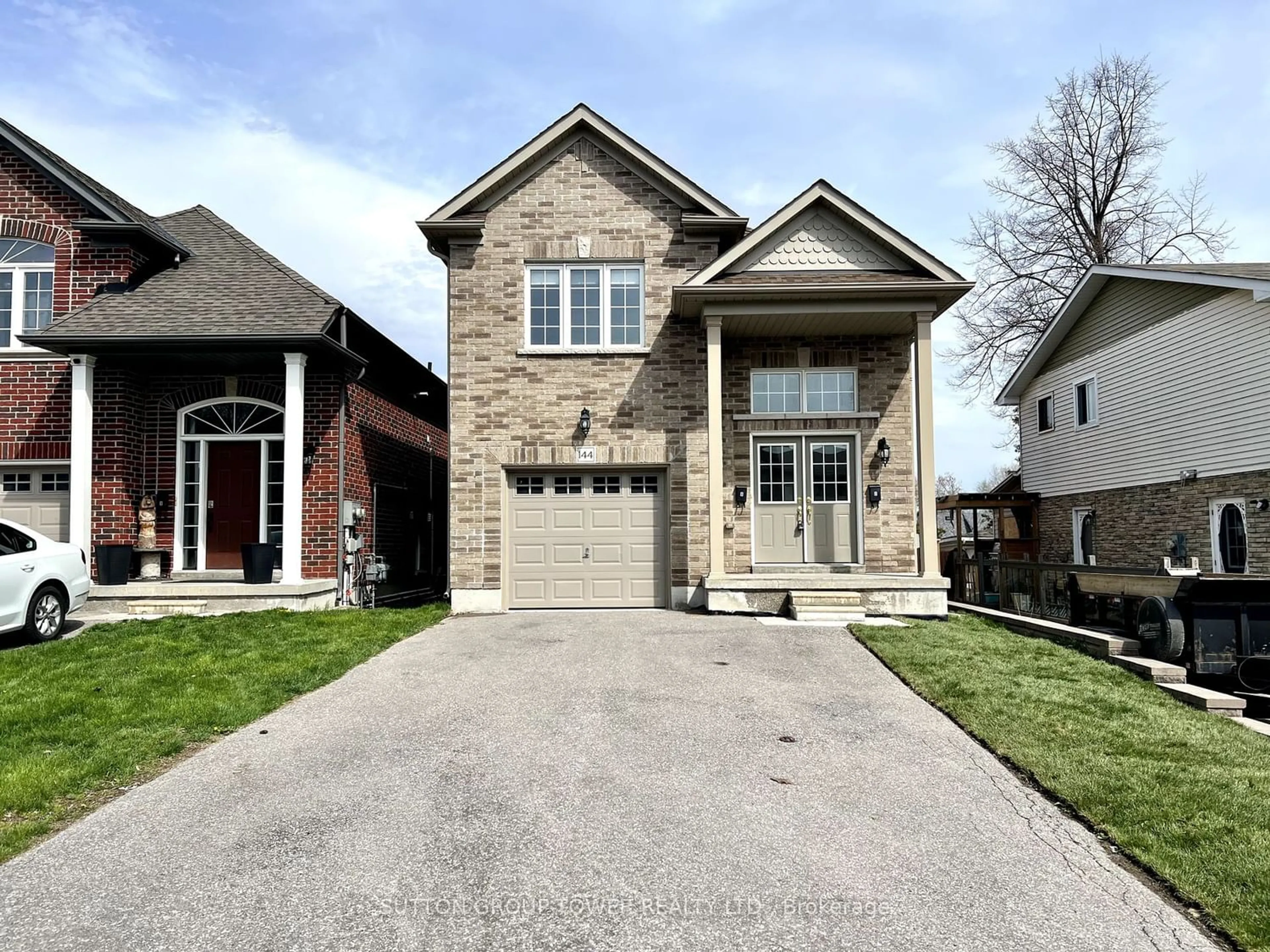 Home with brick exterior material for 144 Capreol Crt, Oshawa Ontario L1J 6E6