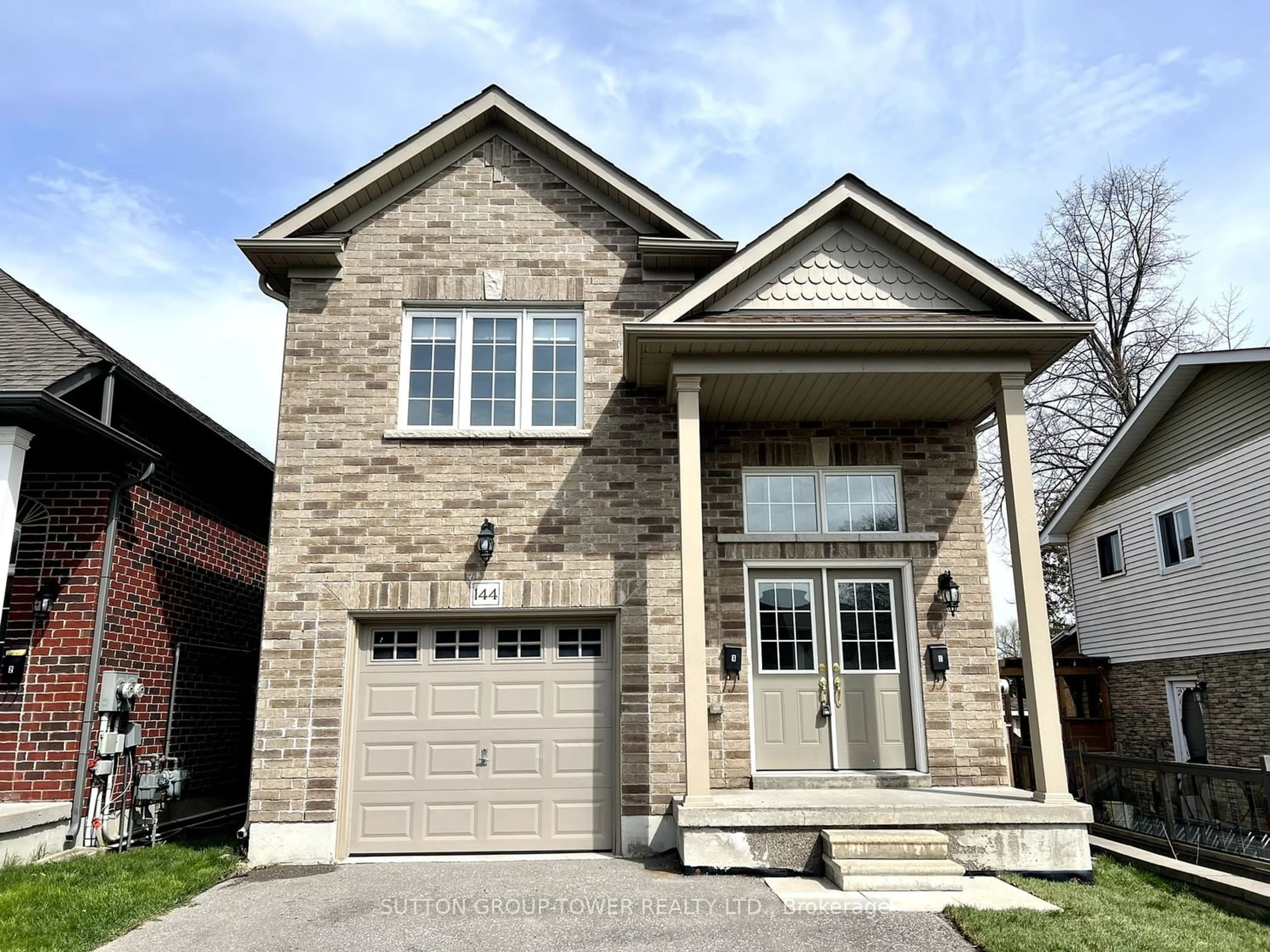 Home with brick exterior material for 144 Capreol Crt, Oshawa Ontario L1J 6E6
