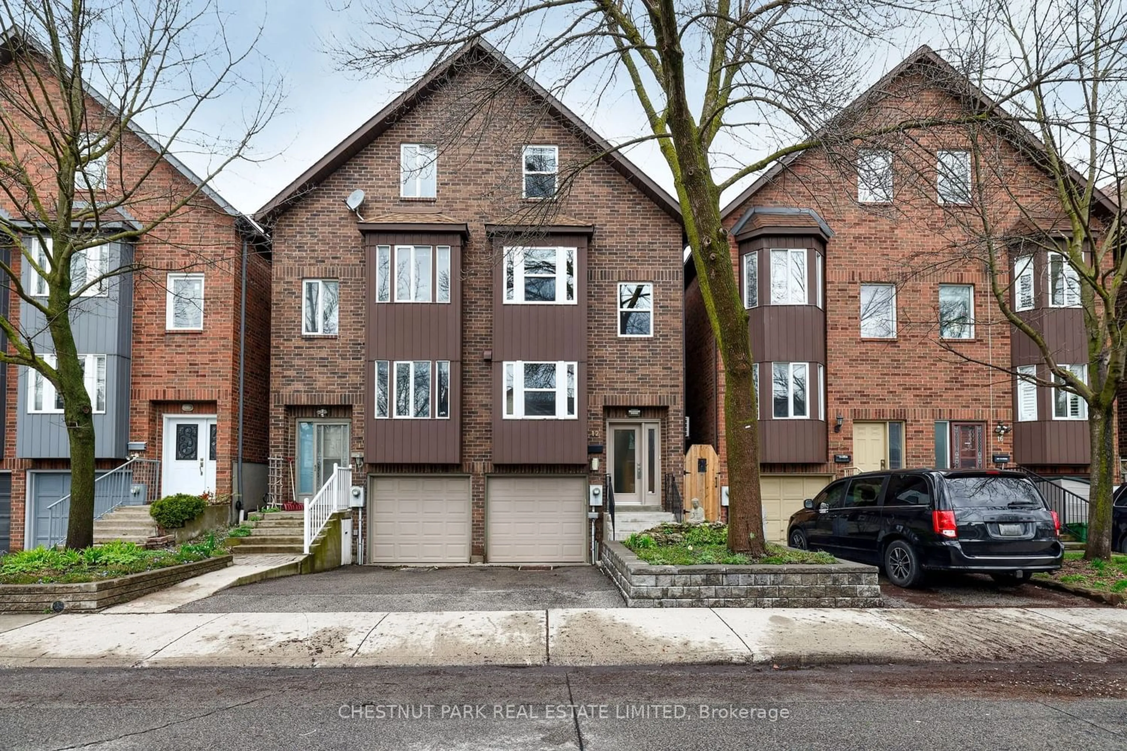 A pic from exterior of the house or condo for 12 Woodrow Ave, Toronto Ontario M4C 5S2