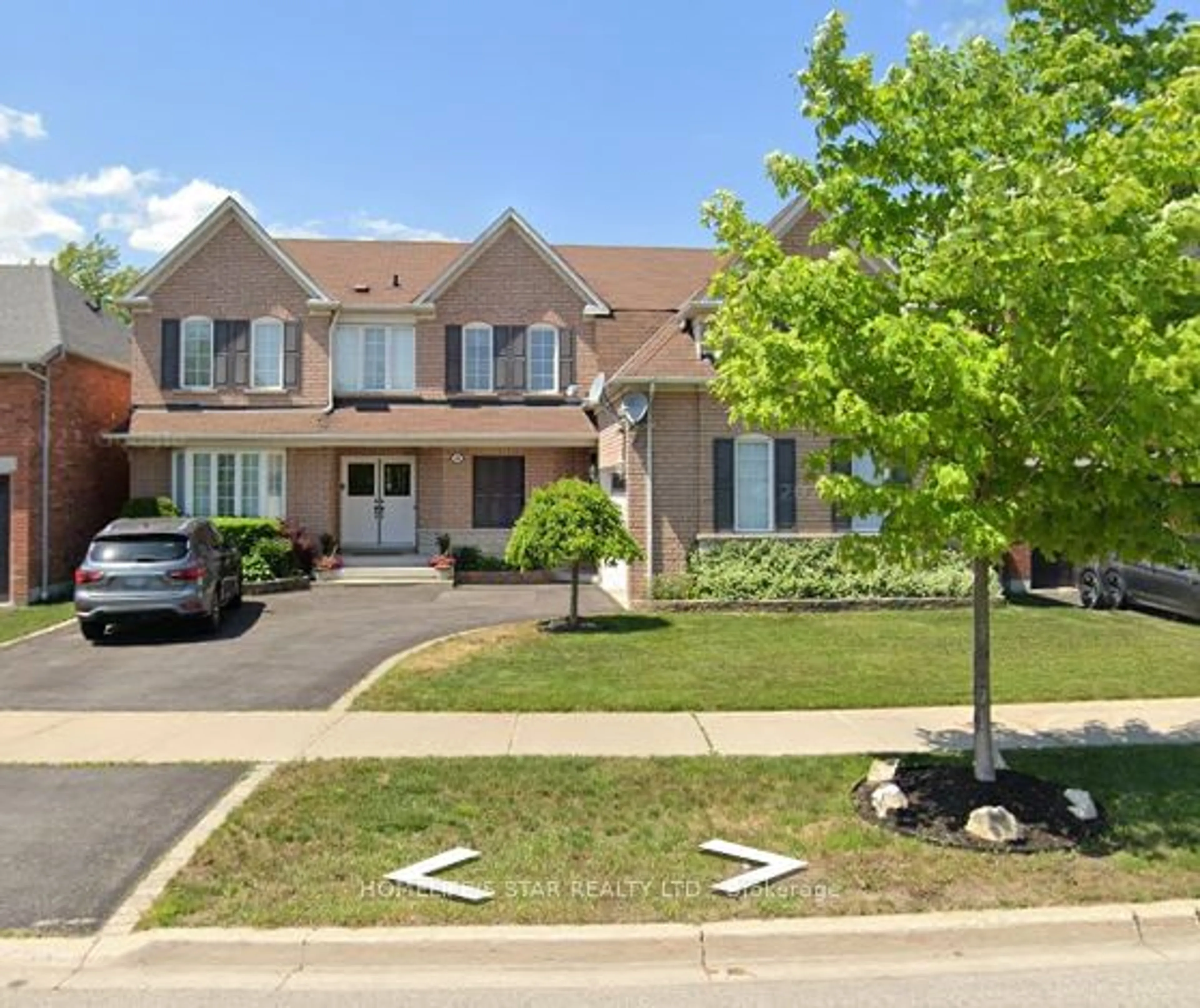 Frontside or backside of a home for 48 Williamson Dr, Ajax Ontario L1T 4M9