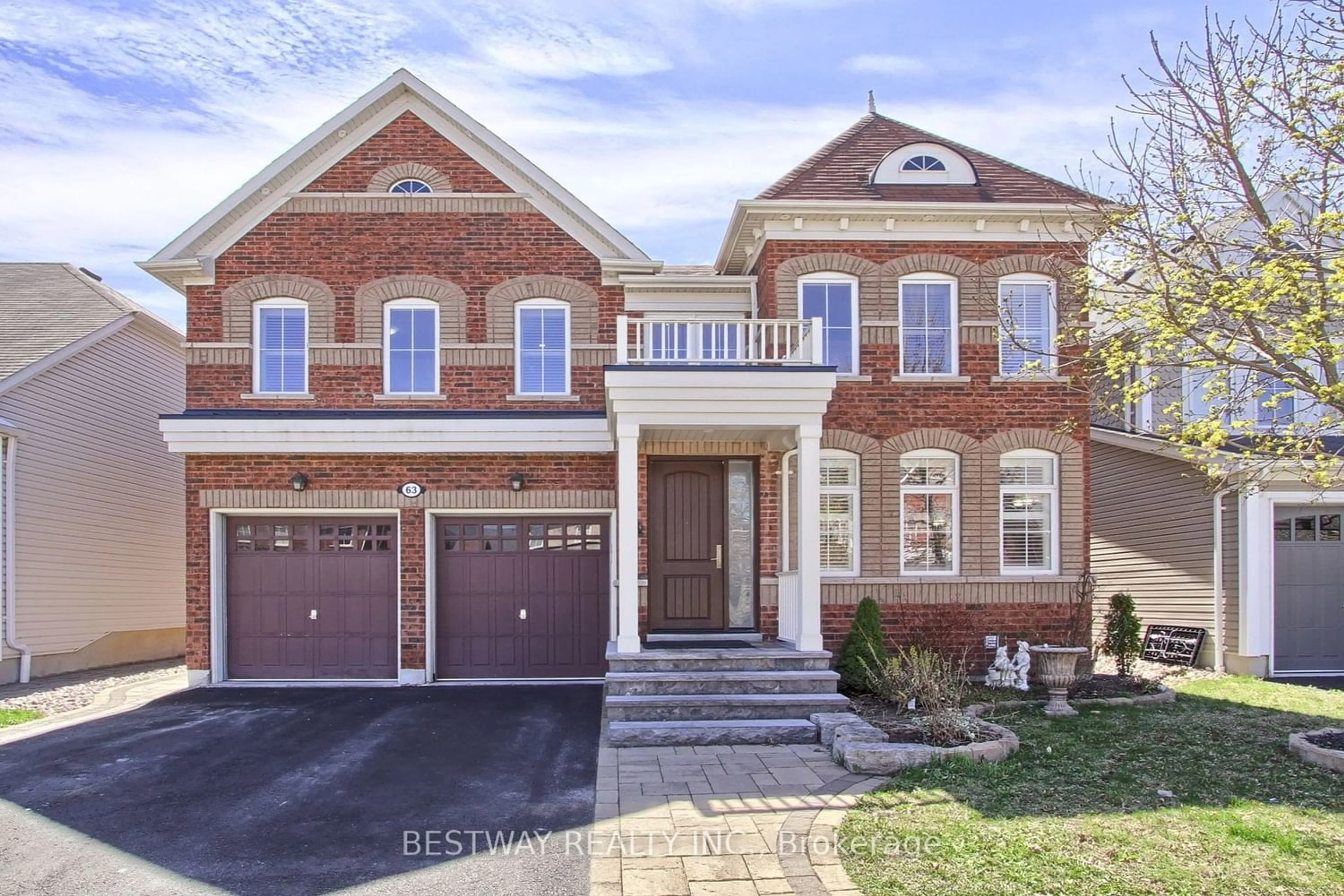 Home with brick exterior material for 63 Joshua Blvd, Whitby Ontario L1M 0J2