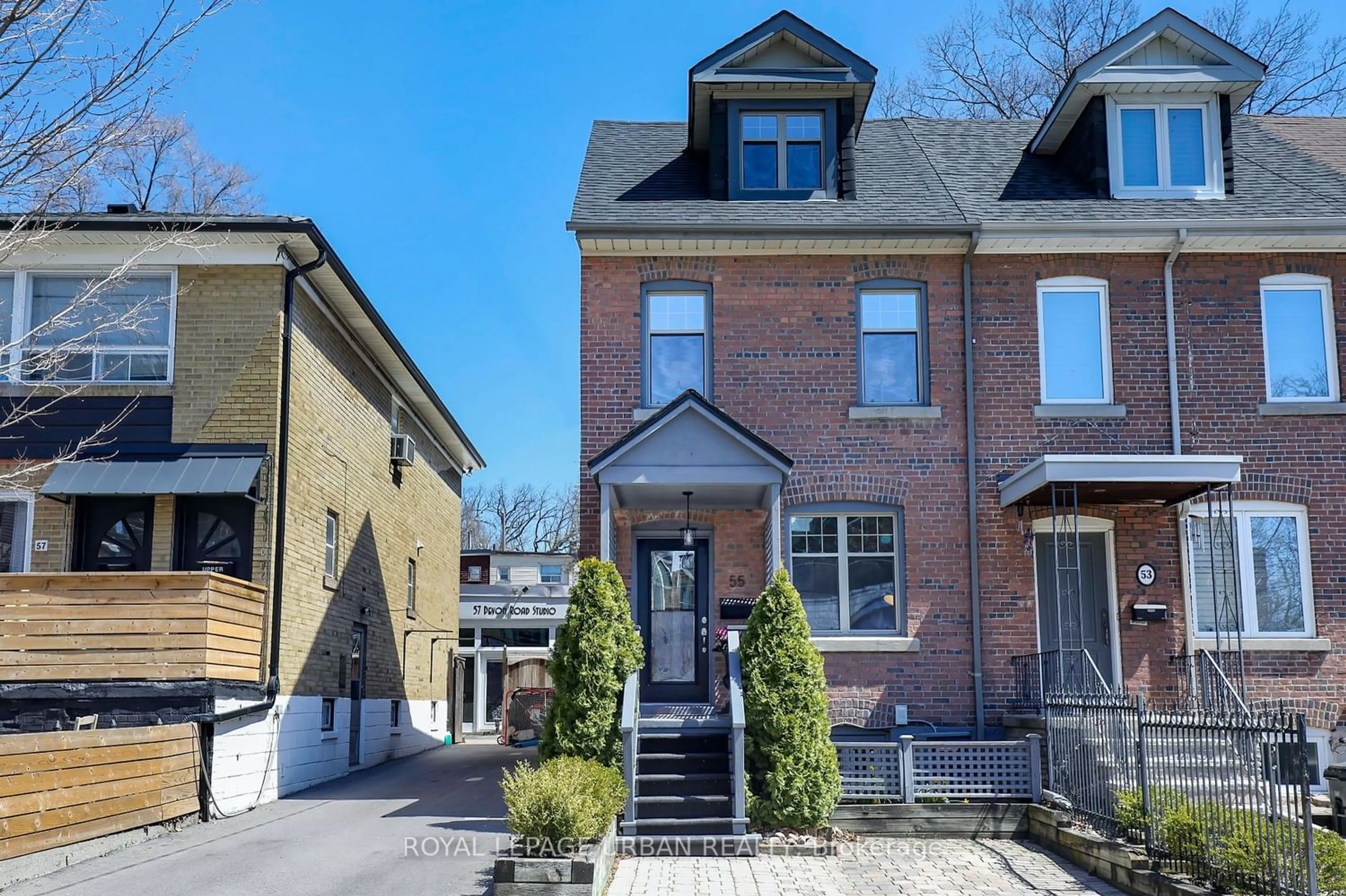 Home with brick exterior material for 55 Devon Rd, Toronto Ontario M4E 2J7