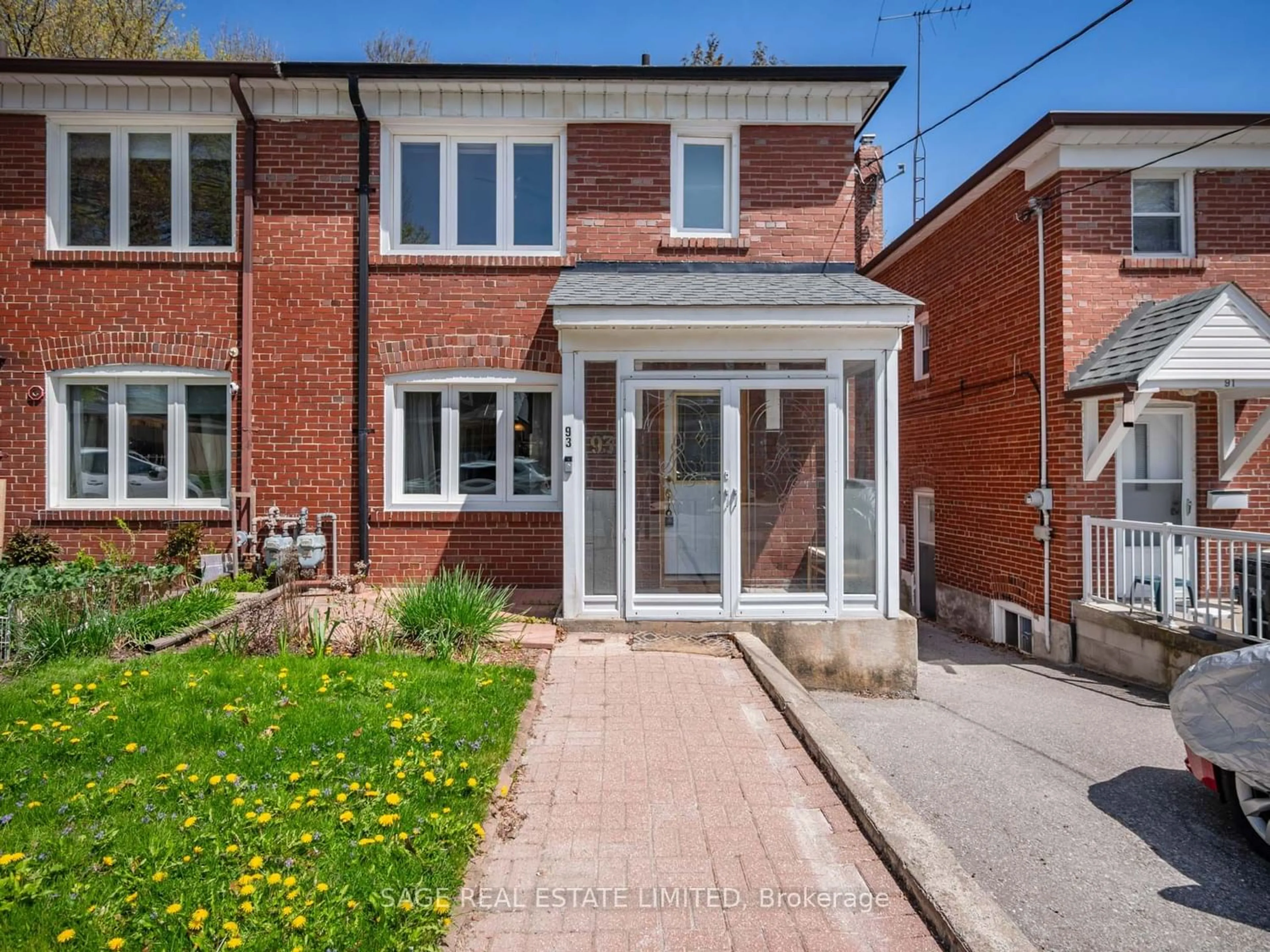 Home with brick exterior material for 93 Billings Ave, Toronto Ontario M4L 2S3